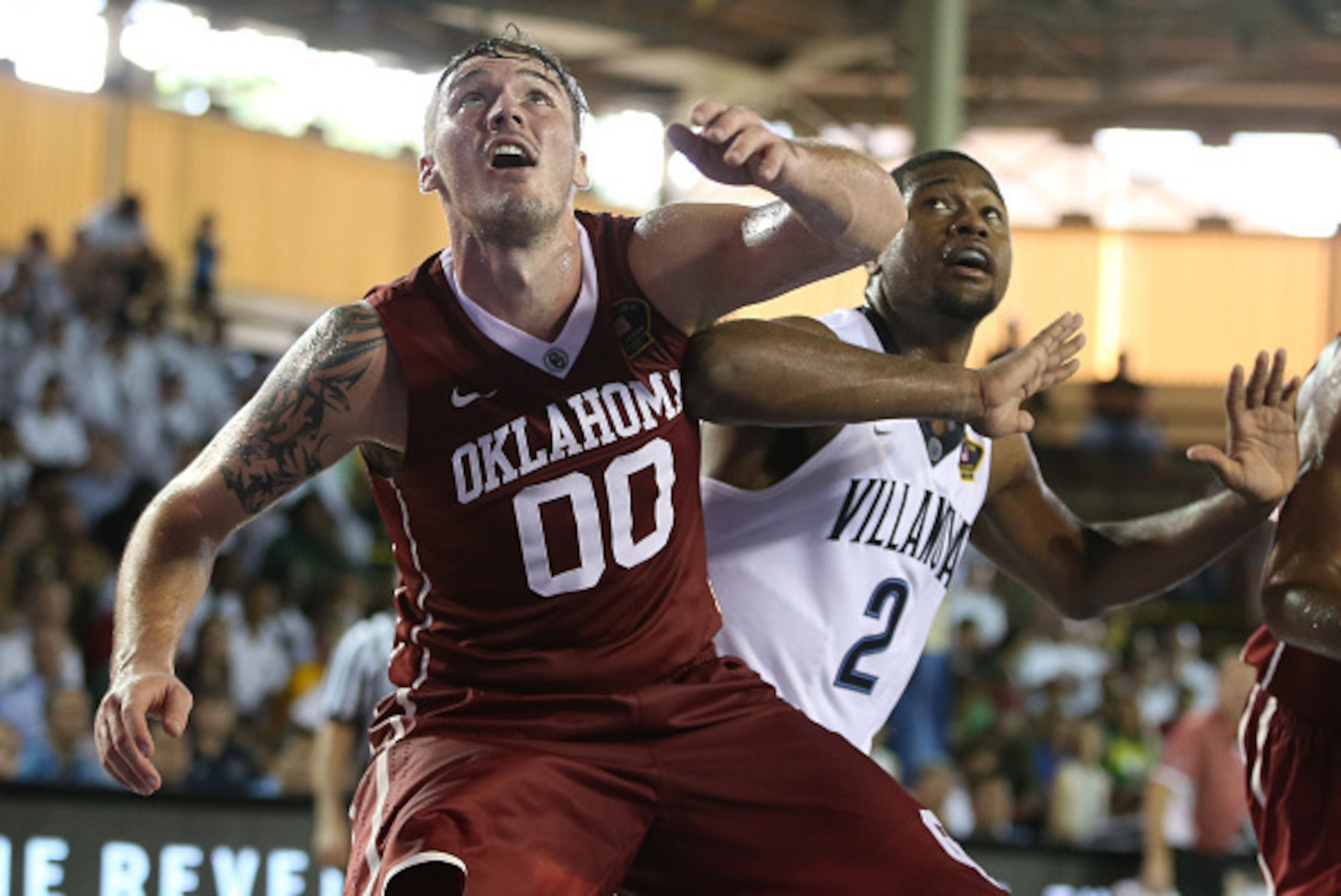 PEARL HARBOR, HI - DECEMBER 7: Ryan Spangler #0 of the Oklahoma Sooners and Kris Jenkins #2 of the Villanova Wildcats fight for position at Bloch Arena on December 7, 2015 in Pearl Harbor, Hawaii. (Photo by Darryl Oumi/Getty Images)