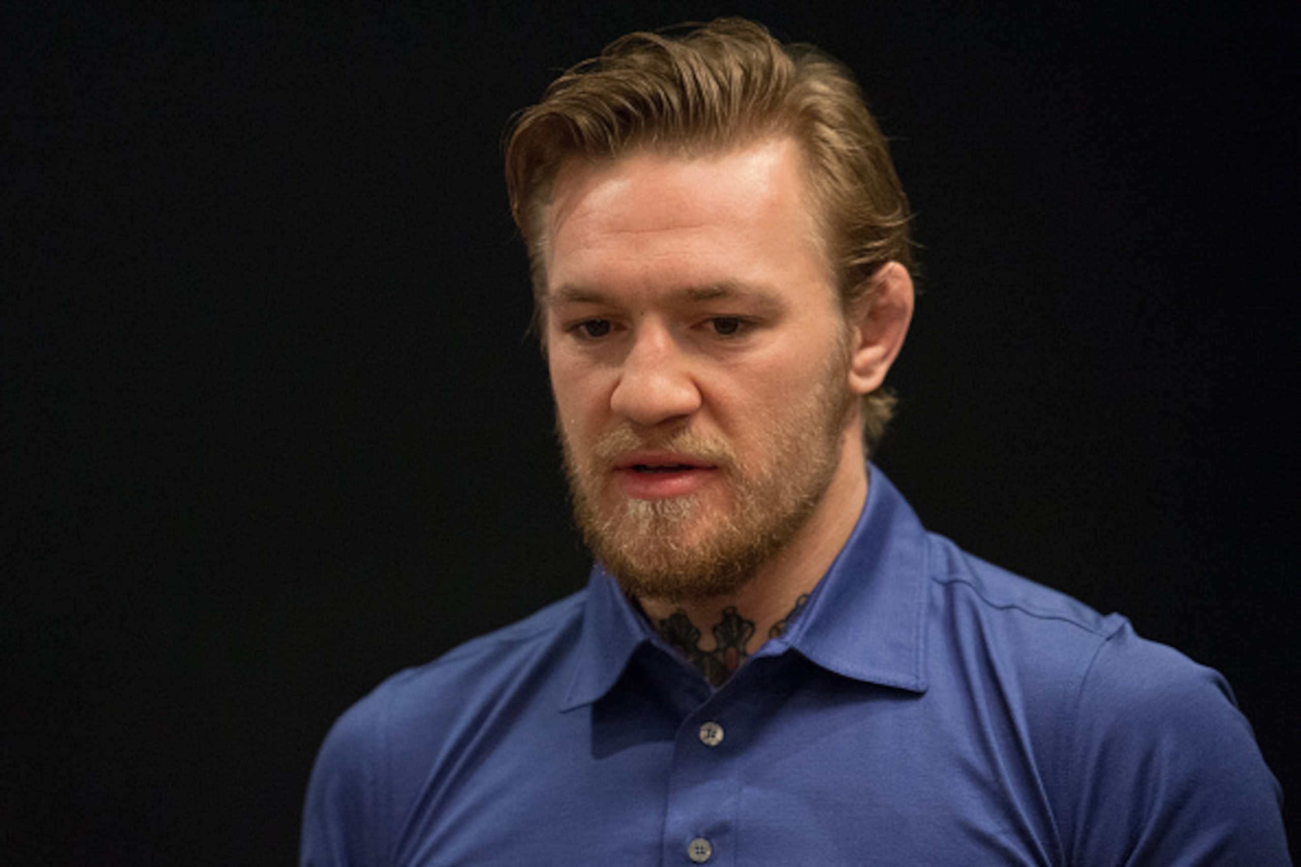 LAS VEGAS, NV - AUGUST 18:  Head coach Conor McGregor watches as Saul Rogers warms up before facing Ryan Hall during the filming of The Ultimate Fighter: Team McGregor vs Team Faber at the UFC TUF Gym on August 18, 2015 in Las Vegas, Nevada. (Photo by Bra