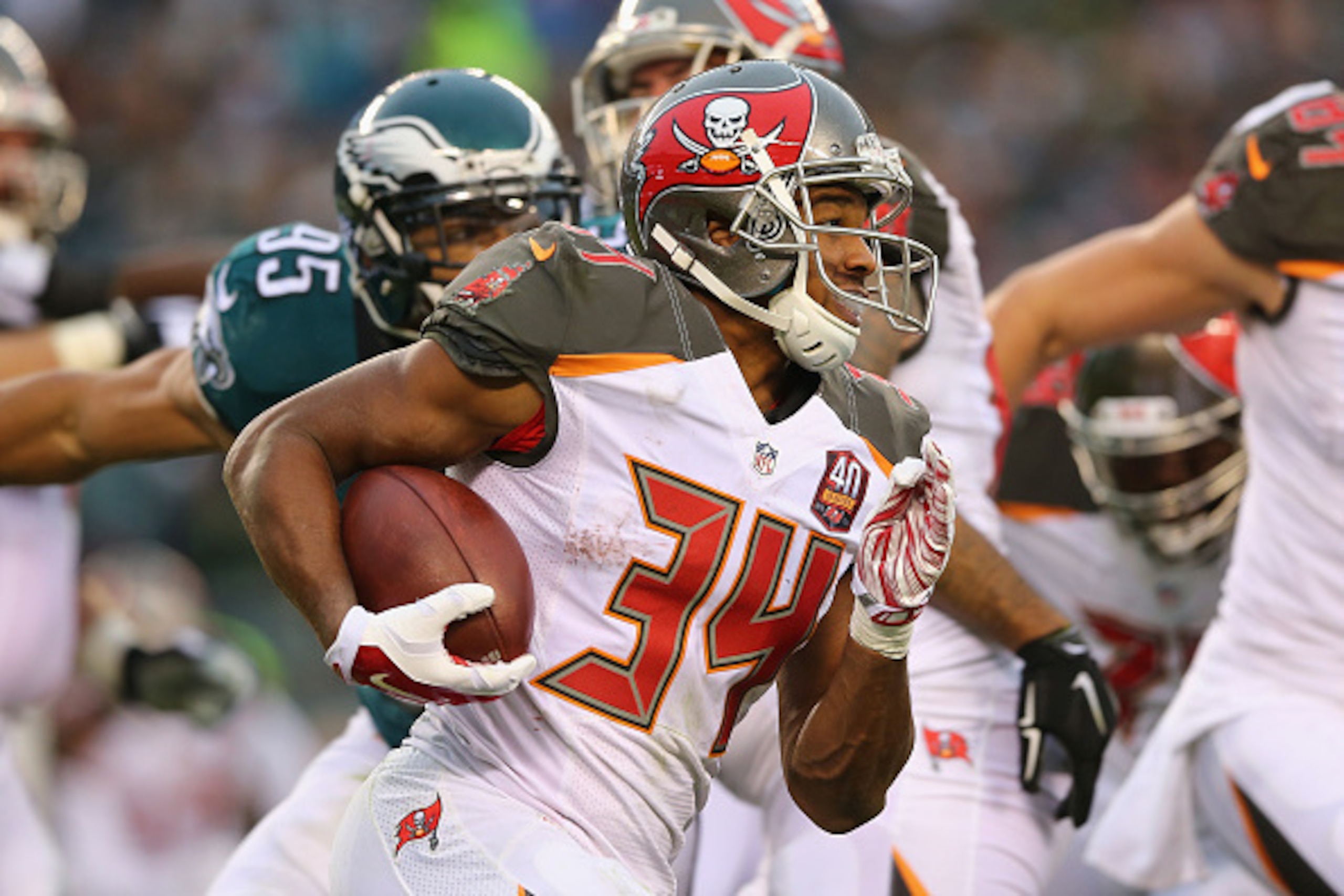 PHILADELPHIA, PA - NOVEMBER 22: Charles Sims #34 of the Tampa Bay Buccaneers carries the ball against the Philadelphia Eagles in the third quarter at Lincoln Financial Field on November 22, 2015 in Philadelphia, Pennsylvania.  (Photo by Elsa/Getty Images)
