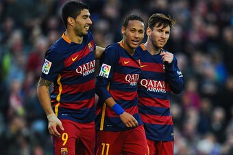 BARCELONA, SPAIN - NOVEMBER 28:  Neymar (C) of FC Barcelona celebrates with his teammates Luis Suarez (L) and Lionel Messi of FC Barcelonaa after scoring his team's third goal of FC Barcelonaduring the La Liga match between FC Barcelona and Real Sociedad 