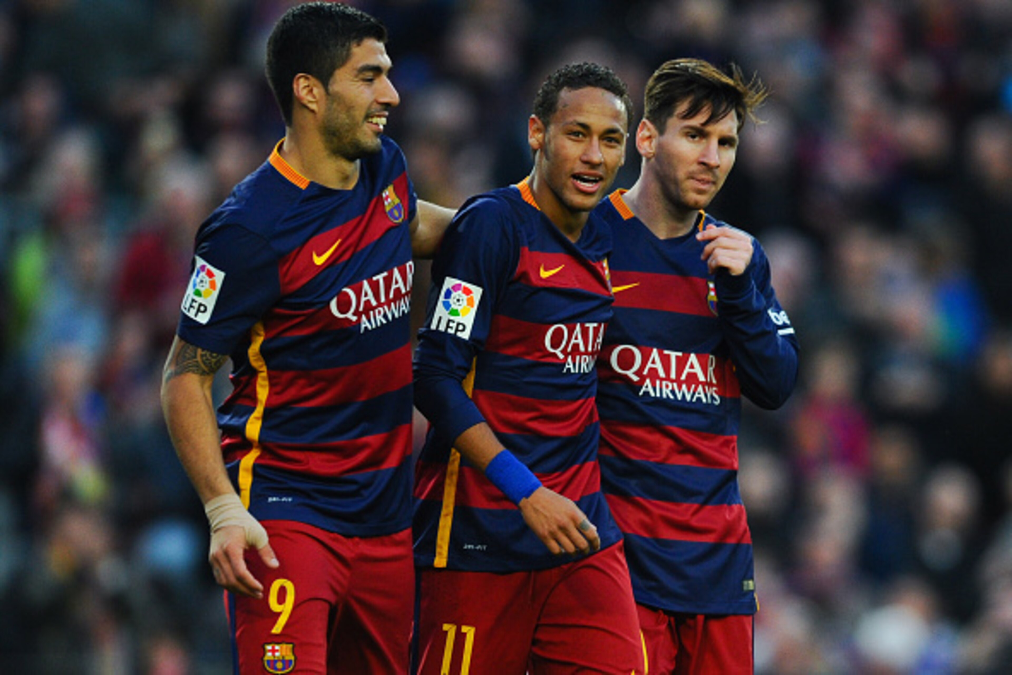 BARCELONA, SPAIN - NOVEMBER 28:  Neymar (C) of FC Barcelona celebrates with his teammates Luis Suarez (L) and Lionel Messi of FC Barcelonaa after scoring his team's third goal of FC Barcelonaduring the La Liga match between FC Barcelona and Real Sociedad 