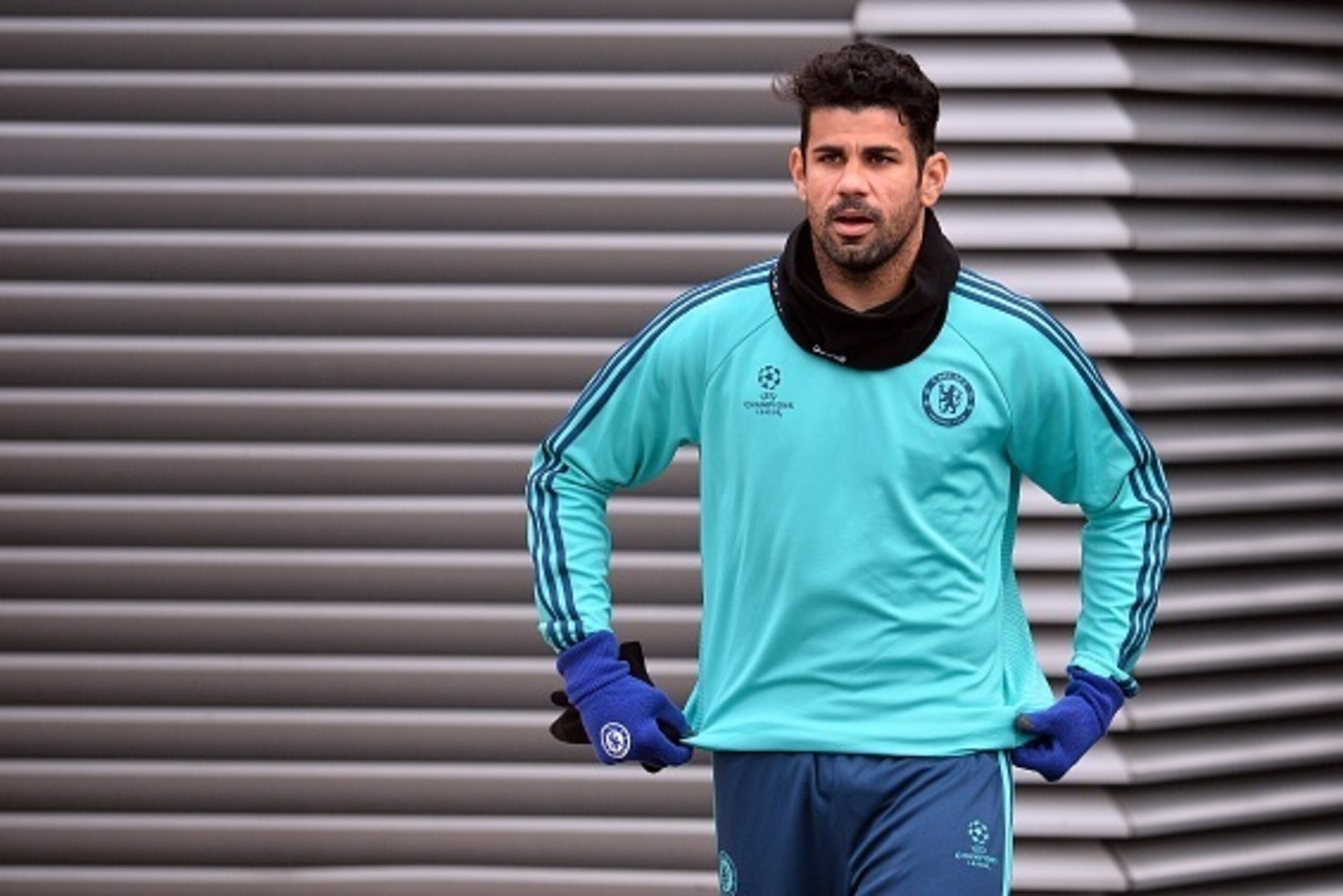 Chelsea's Brazilian-born Spanish striker Diego Costa attends a training session on the eve of a UEFA Champions League, group G football match against Porto at Chelsea's training ground in Cobham, south west London on December 8, 2015. 
AFP PHOTO / GLYN KI