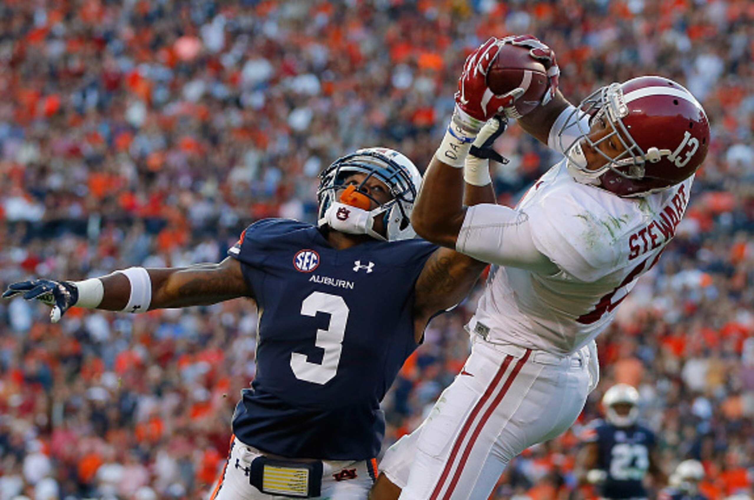 AUBURN, AL - NOVEMBER 28:  ArDarius Stewart #13 of the Alabama Crimson Tide fails to pull in this touchdown reception against Jonathan Jones #3 of the Auburn Tigers at Jordan Hare Stadium on November 28, 2015 in Auburn, Alabama.  (Photo by Kevin C. Cox/Ge
