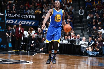 BROOKLYN, NY - DECEMBER 6: Draymond Green #23 of the Golden State Warriors handles the ball during the game against the Brooklyn Nets on December 6, 2015 at Barclays Center in Brooklyn, New York. NOTE TO USER: User expressly acknowledges and agrees that, 