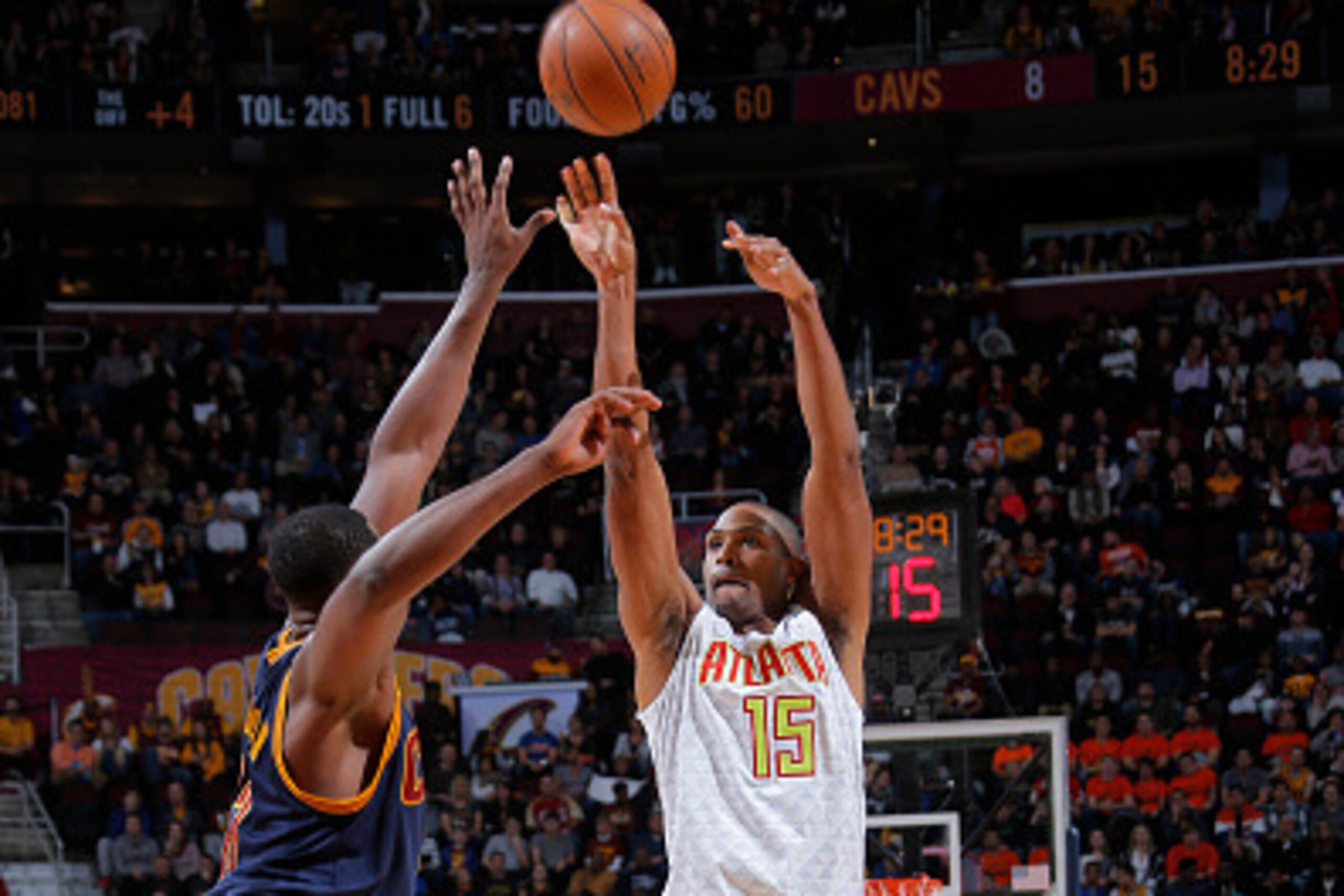 CLEVELAND, OH - NOVEMBER 21: Al Horford #15 of the Atlanta Hawks shoots against Tristan Thompson #13 of the Cleveland Cavaliers on November 21, 2015 at Quicken Loans Arena in Cleveland, Ohio. NOTE TO USER: User expressly acknowledges and agrees that, by d