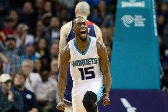CHARLOTTE, NC - NOVEMBER 25:  Kemba Walker #15 of the Charlotte Hornets reacts after a play during their game against the Washington Wizards at Time Warner Cable Arena on November 25, 2015 in Charlotte, North Carolina.  NBA - NOTE TO USER: User expressly 