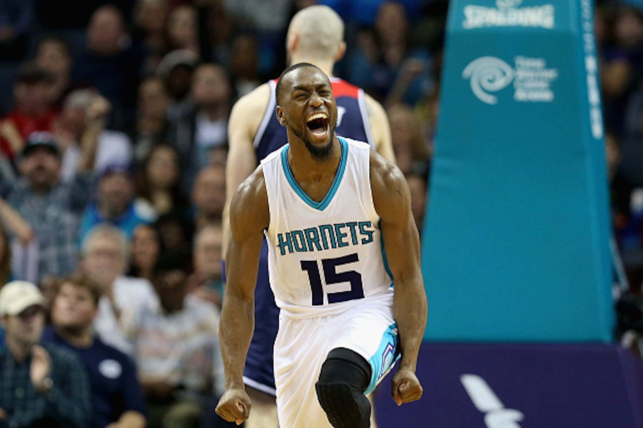 CHARLOTTE, NC - NOVEMBER 25:  Kemba Walker #15 of the Charlotte Hornets reacts after a play during their game against the Washington Wizards at Time Warner Cable Arena on November 25, 2015 in Charlotte, North Carolina.  NBA - NOTE TO USER: User expressly 