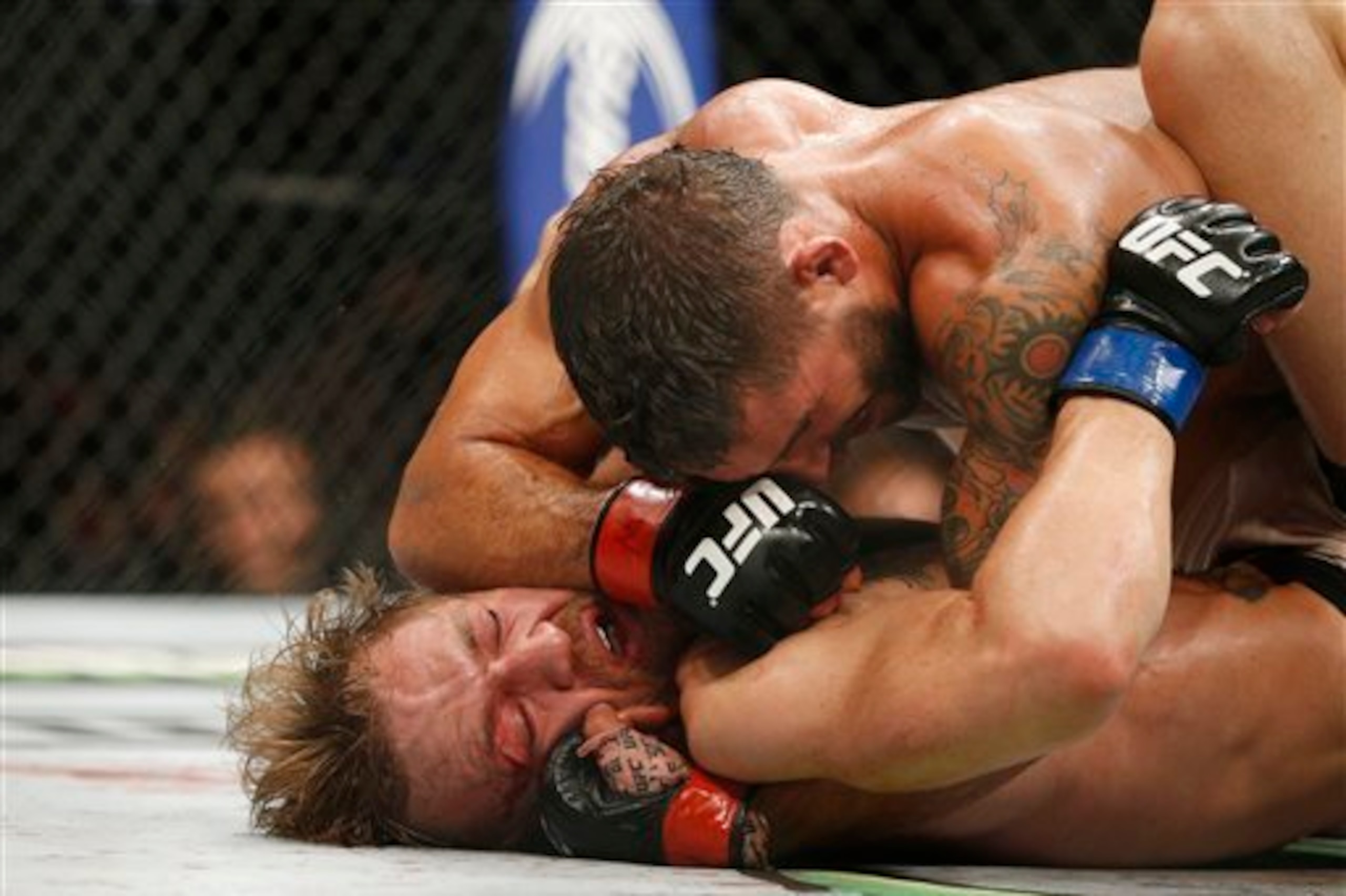 Chad Mendes grounds McGregor at UFC 189.