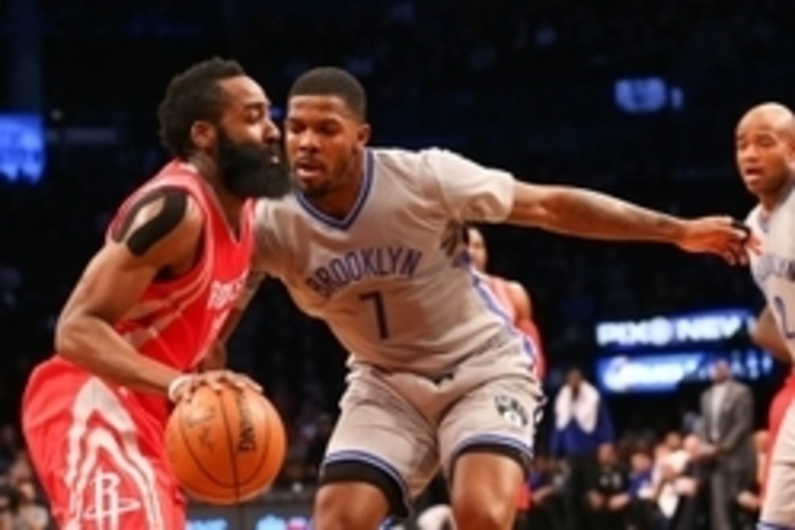 Dec 8, 2015; Brooklyn, NY, USA;  Houston Rockets guard James Harden (13) drives past Brooklyn Nets forward Joe Johnson (7) during the first quarter at Barclays Center. Mandatory Credit: Anthony Gruppuso-USA TODAY Sports