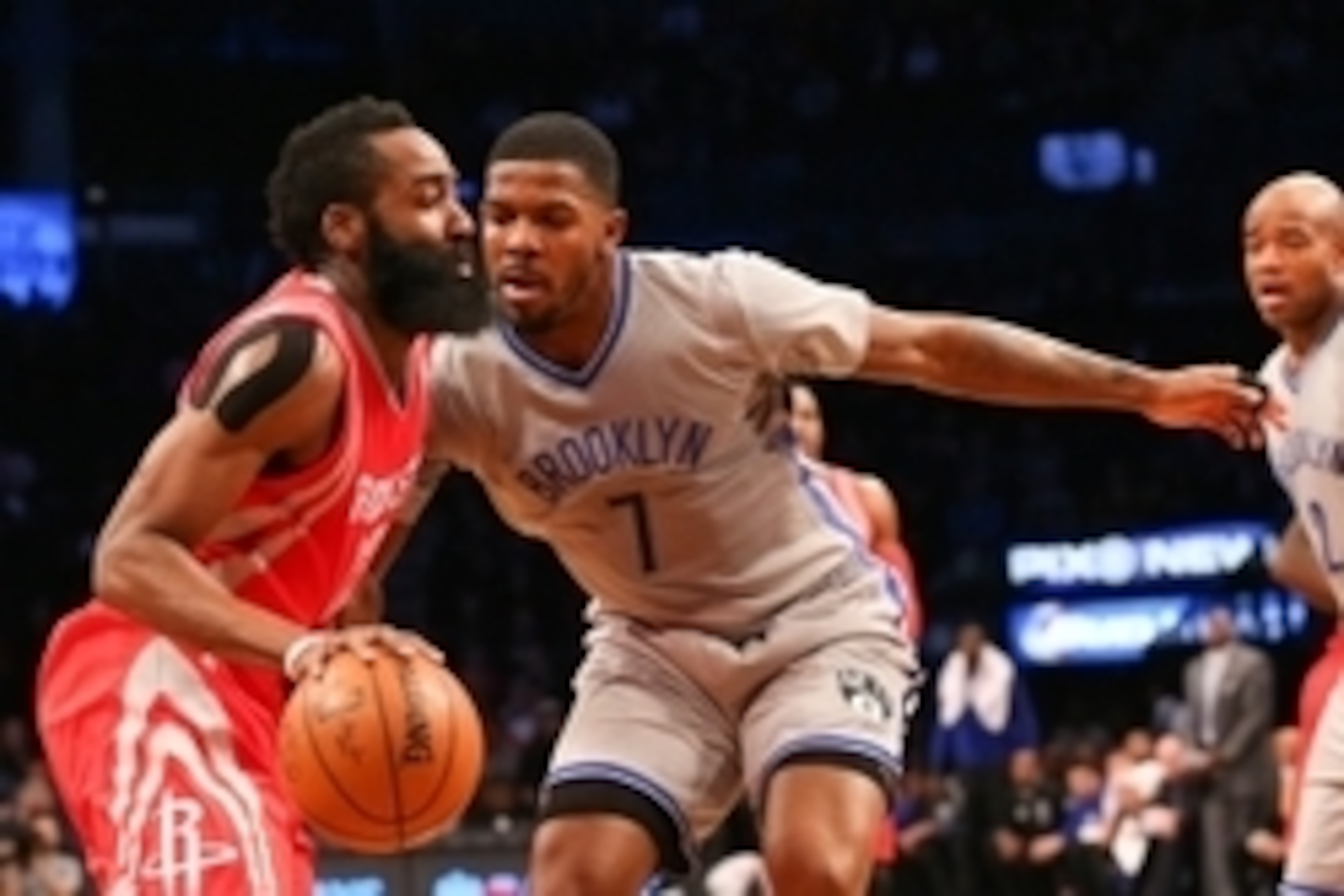 Dec 8, 2015; Brooklyn, NY, USA;  Houston Rockets guard James Harden (13) drives past Brooklyn Nets forward Joe Johnson (7) during the first quarter at Barclays Center. Mandatory Credit: Anthony Gruppuso-USA TODAY Sports