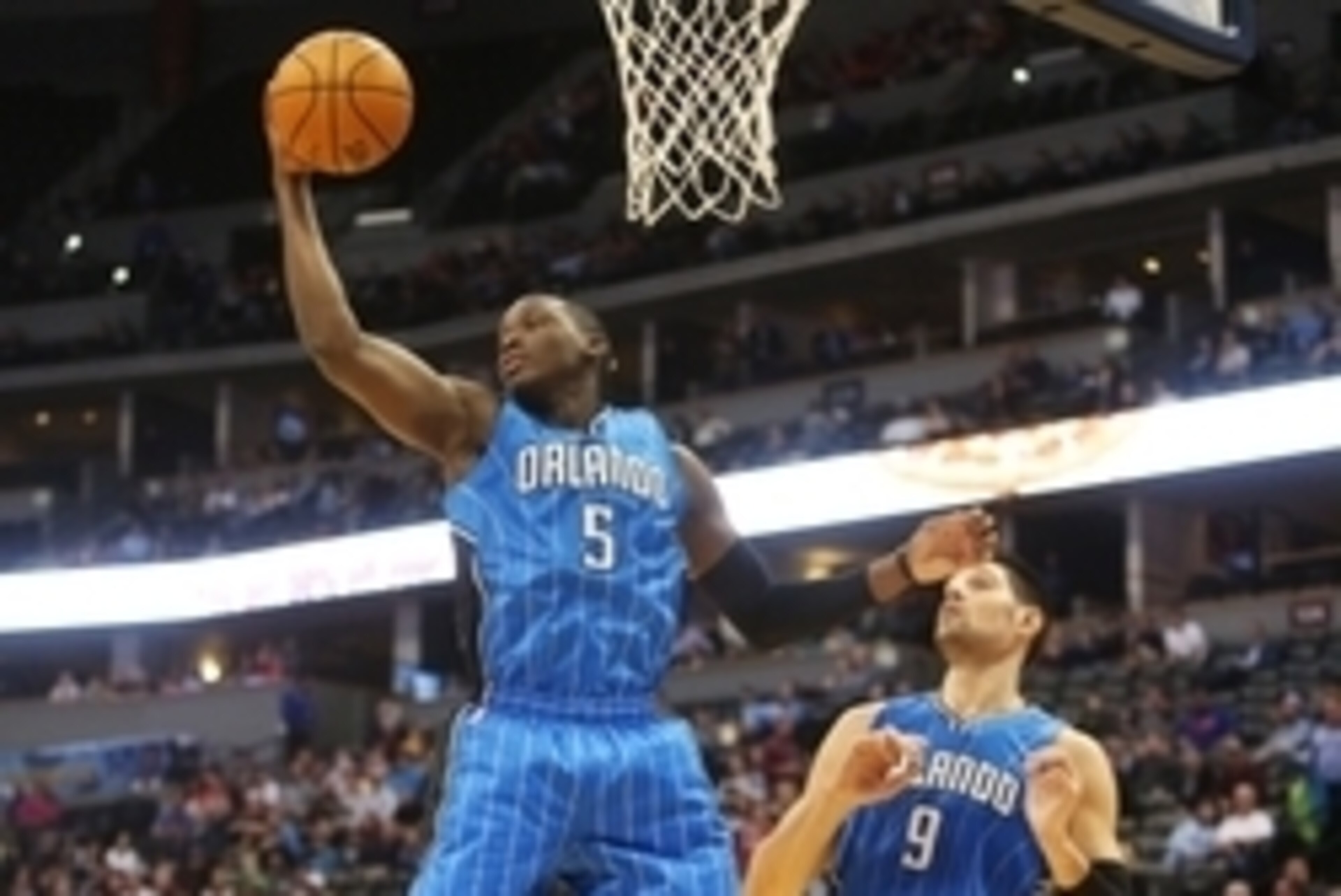 Dec 8, 2015; Denver, CO, USA; Orlando Magic guard Victor Oladipo (5) rebounds the ball during the first half against the Denver Nuggets at Pepsi Center. Mandatory Credit: Chris Humphreys-USA TODAY Sports
