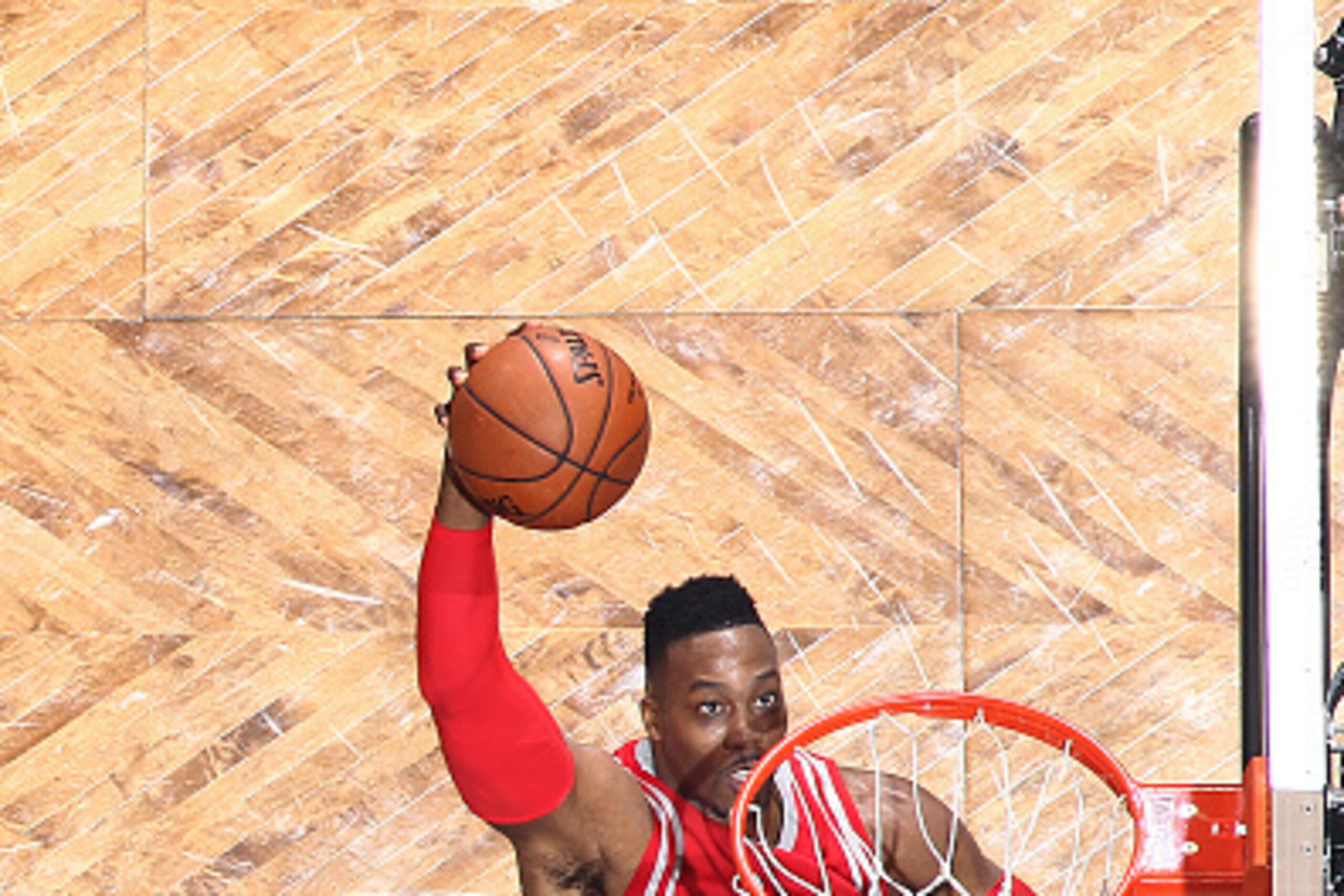 BROOKLYN, NY - DECEMBER 8: Dwight Howard #12 of the Houston Rockets goes for the dunk during the game against the Brooklyn Nets on December 8, 2015 at Barclays Center in Brooklyn, New York. NOTE TO USER: User expressly acknowledges and agrees that, by dow