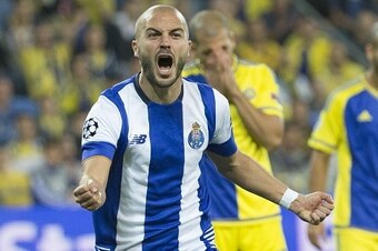 Porto's Portuguese midfielder Andre Andre (C) reacts after scoring a goal during the UEFA Champions League, group G, football match between Maccabi Tel Aviv and FC Porto at the Sammy Ofer Stadium, in the Israeli coastal city of Haifa, on November 4, 2015.
