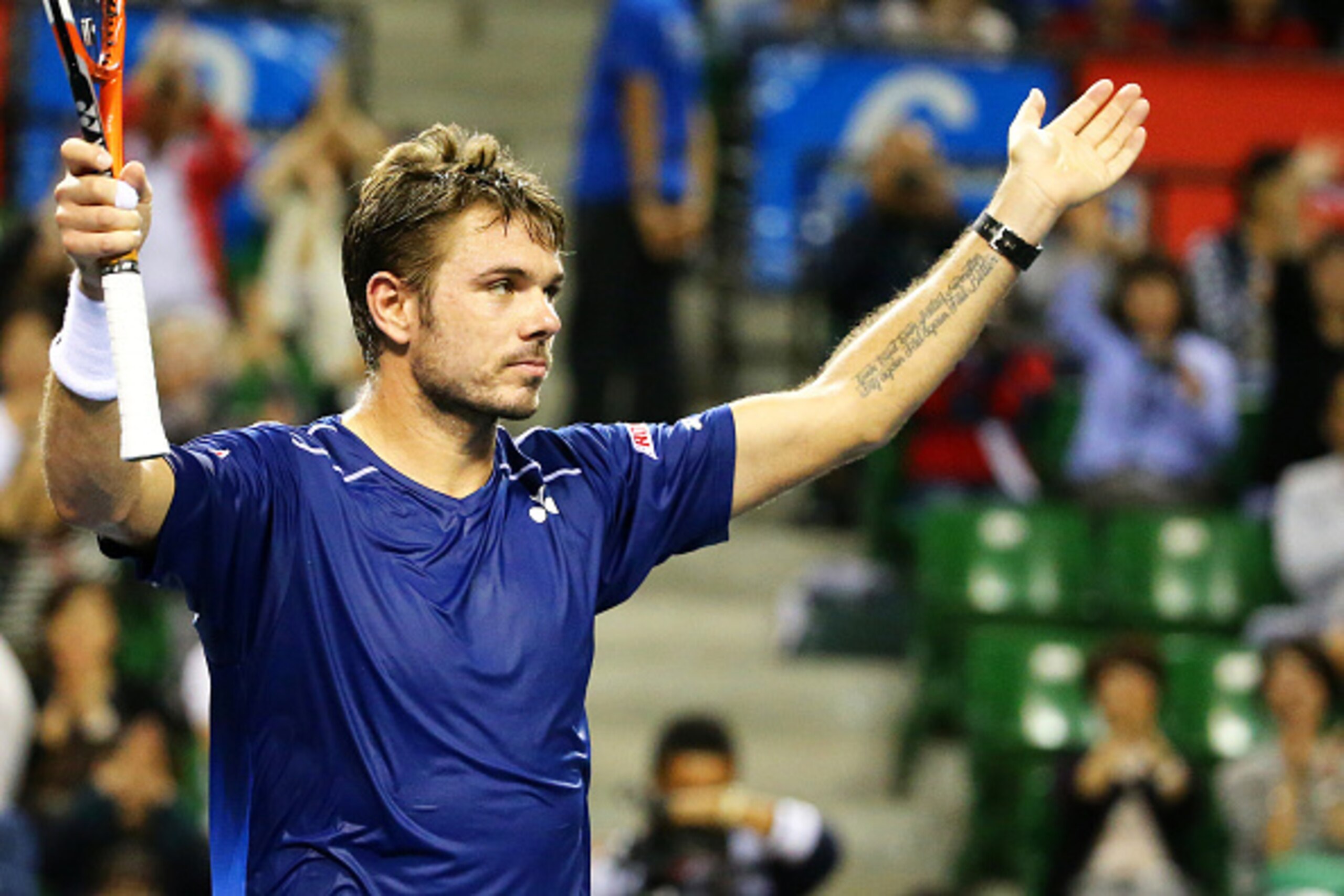 TOKYO, JAPAN - OCTOBER 11:  Stan Wawrinka of Switzerland celebrates after winning the men's singles final match against Benoit Paire of France on Day Seven of the Rakuten Open 2015 at Ariake Colosseum on October 11, 2015 in Tokyo, Japan.  (Photo by Koji W
