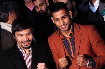 LONDON, ENGLAND - JANUARY 23:  Manny Pacquiao and Amir Khan pose after holding discussions about the possibility of a future fight, at Fitzroy Lodge Amateur Boxing Club on January 23, 2015 in London, England.  (Photo by Martin Willetts/Getty Images)