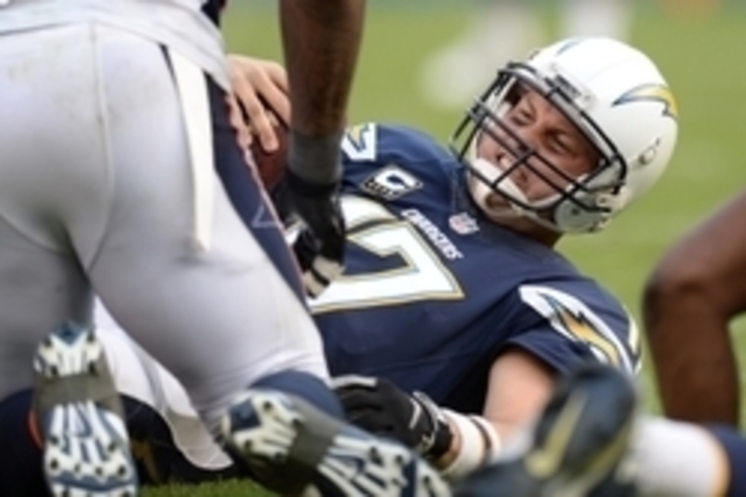 Dec 6, 2015; San Diego, CA, USA; San Diego Chargers quarterback Philip Rivers (17) reacts after a sack in the fourth quarter against the Denver Broncos at Qualcomm Stadium. Mandatory Credit: Jake Roth-USA TODAY Sports