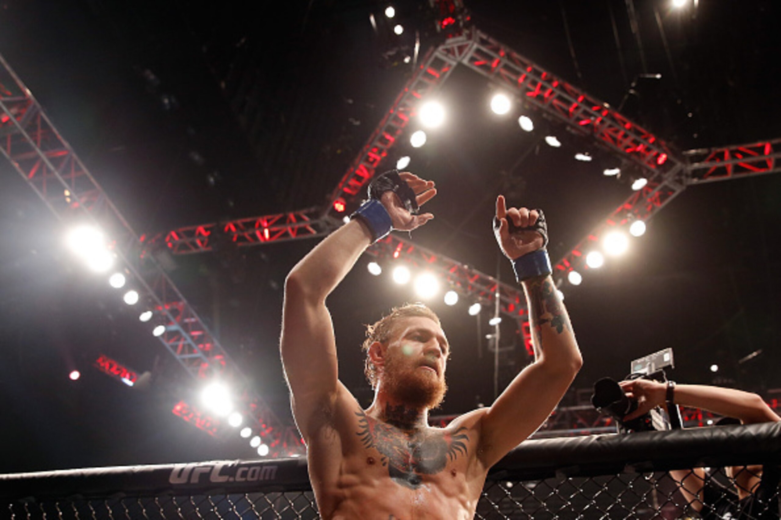 LAS VEGAS, NV - JULY 11:  Conor McGregor  reacts to his victory over Chad Mendes in their UFC interim featherweight title fight during the UFC 189 event inside MGM Grand Garden Arena on July 11, 2015 in Las Vegas, Nevada.  (Photo by Christian Petersen/Zuf