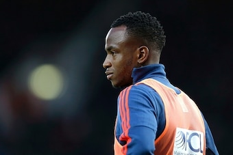 West Bromwich Albion's substitute Saido Berahino watches from the touchline during the English Premier League football match between West Ham United and West Bromwich Albion at The Boleyn Ground in Upton Park, East London on November 29, 2015. The game fi