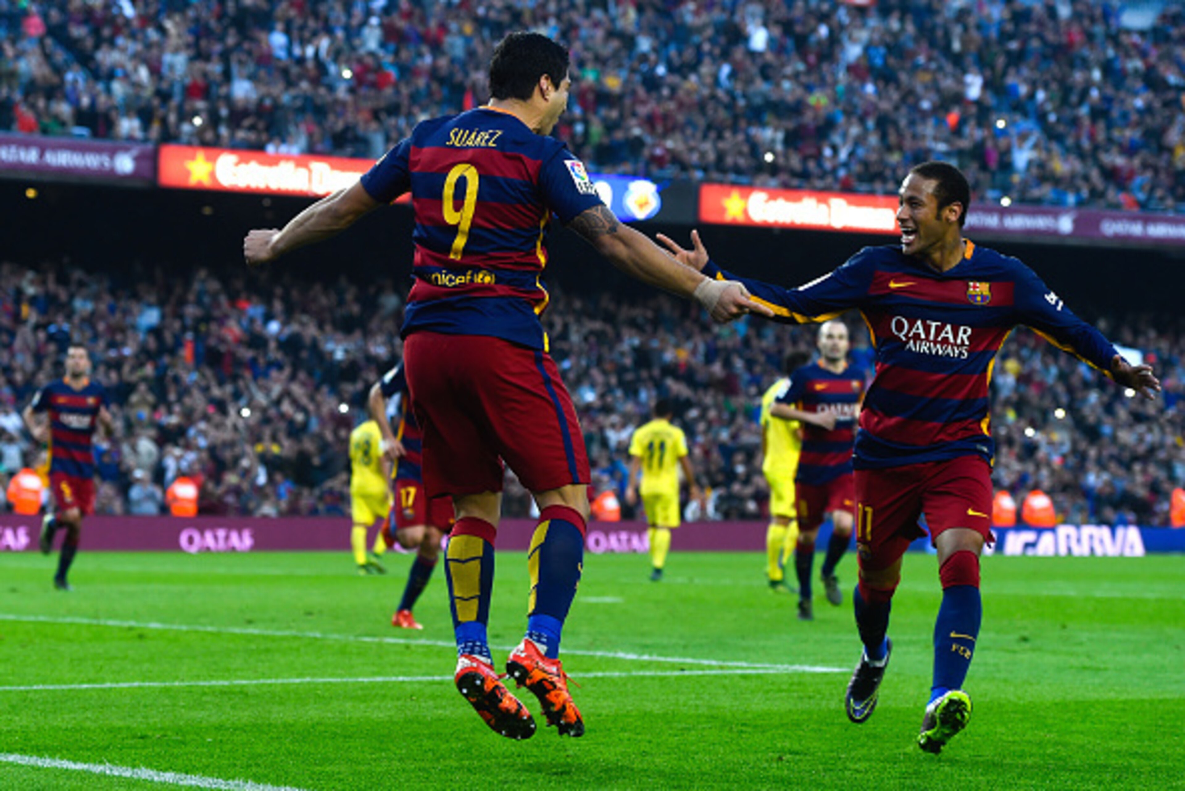 BARCELONA, SPAIN - NOVEMBER 08:  Luis Suarez of FC Barcelona celebrates with his team mate Neymar of FC Barcelona after scoring his team's second goal from the penalty spot during the La Liga match between FC Barcelona and Villarreal CF at Camp Nou on Nov