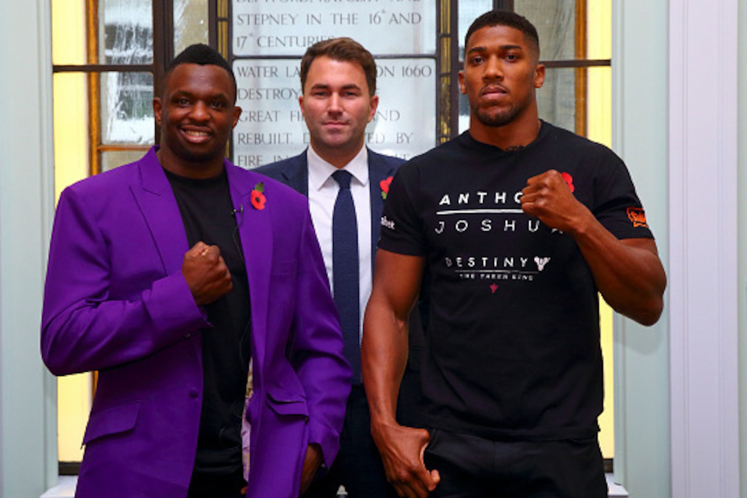 LONDON, ENGLAND - NOVEMBER 03:  Anthony Joshua (R) and Dillian Whyte (L) pose for a photo with promoter Eddie Hearn (C) during the Anthony Joshua and Dillian Whyte Press Conference at Trinity House on November 3, 2015 in London, England.  (Photo by Jordan