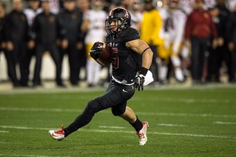 SANTA CLARA, CA - DECEMBER 05:  Running back Christian McCaffrey #5 of the Stanford Cardinal rushes up field against the USC Trojans during the third quarter of the Pac-12 Championship game at Levi's Stadium on December 5, 2015 in Santa Clara, California.