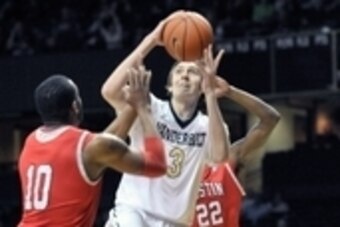 Dec 17, 2013; Nashville, TN, USA; Vanderbilt Commodores forward Luke Kornet (3) drives to the basket for the shot against Austin Peay Governors forward Will Triggs (10) during the first half at Memorial Gym. Mandatory Credit: Jim Brown-USA TODAY Sports