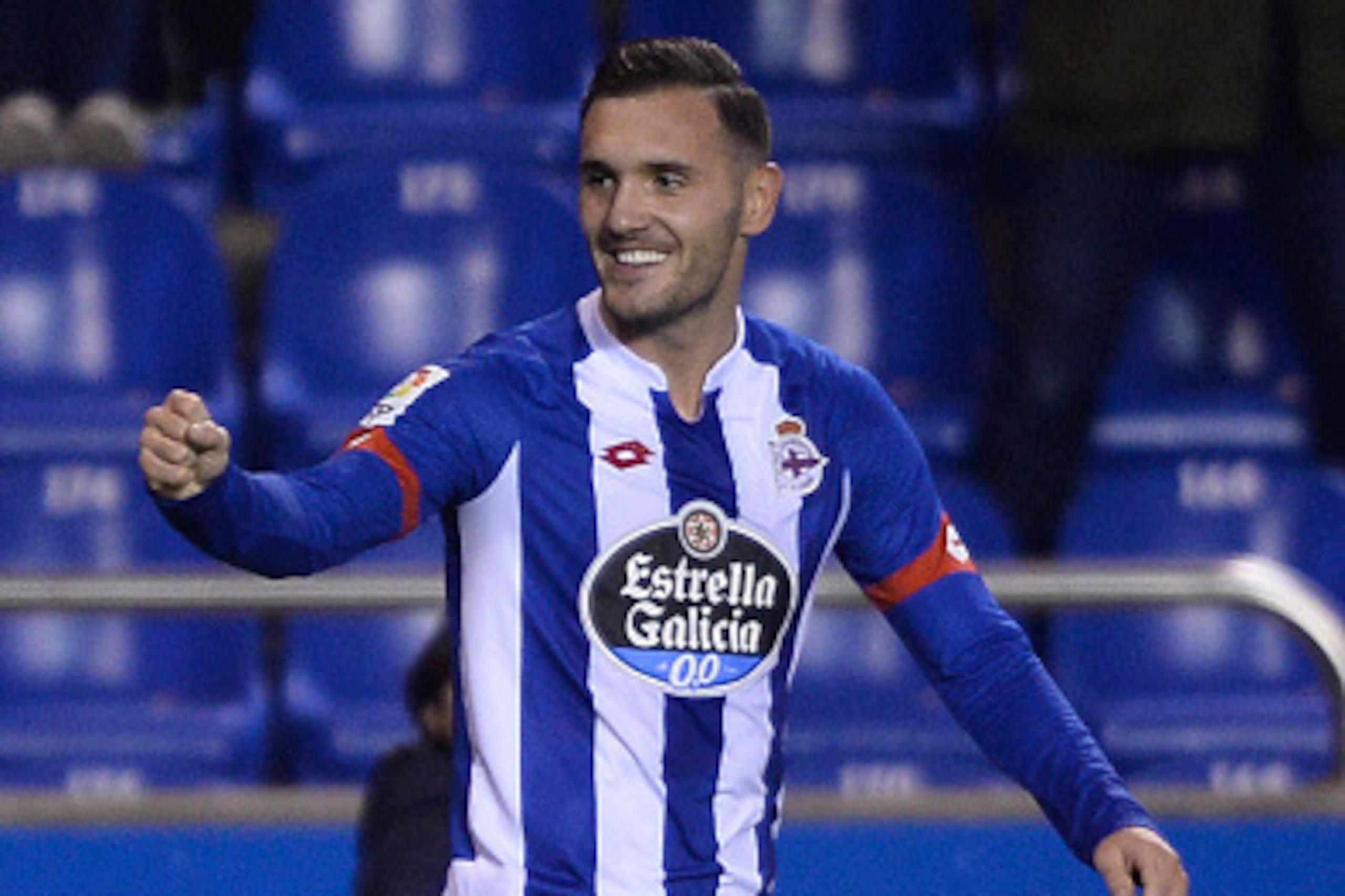 Deportivo La Coruna's midfielder Lucas Perez celebrates after scoring a goal during the Spanish league football match RC Deportivo de la Coruna vs Sevilla FC at the Municipal de Riazor stadium in La Coruna on December 5, 2015. / AFP / MIGUEL RIOPA Deportivo La Coruna's midfielder Lucas Perez celebrates after scoring a goal during the Spanish league football match RC Deportivo de la Coruna vs Sevilla FC at the Municipal de Riazor stadium in La Coruna on December 5, 2015. / AFP / MIGUEL RIOPA
