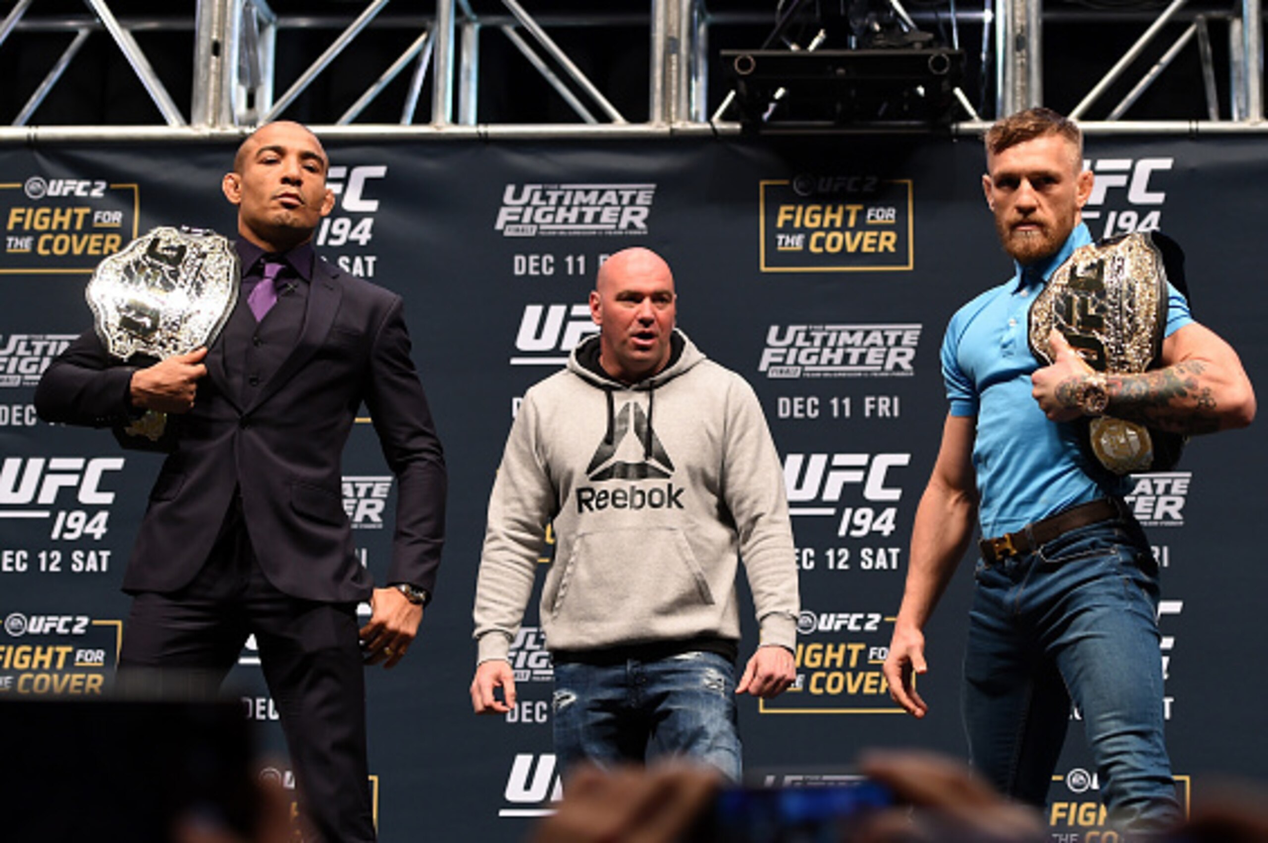 LAS VEGAS, NV - DECEMBER 09:  (L-R) Opponents Jose Aldo of Brazil and Conor McGregor of Ireland pose for photos during the UFC Press Conference inside MGM Grand Garden Arena on December 9, 2015 in Las Vegas, Nevada.  (Photo by Josh Hedges/Zuffa LLC/Zuffa 