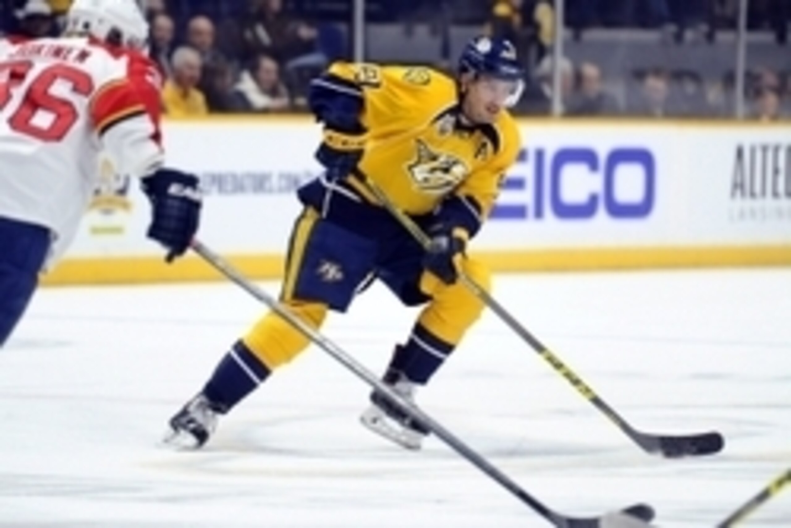 Dec 3, 2015; Nashville, TN, USA; Nashville Predators defenseman Roman Josi (59) skates the puck into the offensive zone during the first period against the Florida Panthers at Bridgestone Arena. Mandatory Credit: Christopher Hanewinckel-USA TODAY Sports