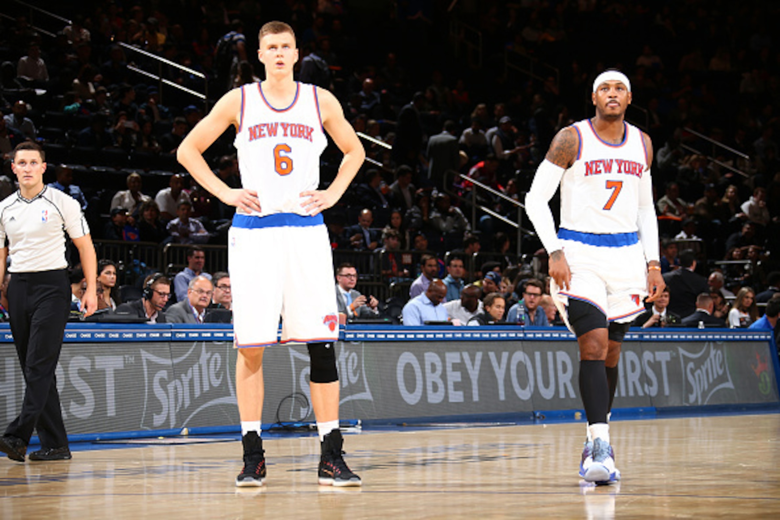 NEW YORK, NY - OCTOBER 7: Kristaps Porzingis #6 of the New York Knicks and Carmelo Anthony #7 of the New York Knicks stand on the court against Paschoalotto/Bauru during a preseason game on October 7, 2015 at Madison Square Garden in New York City, New Y NEW YORK, NY - OCTOBER 7: Kristaps Porzingis #6 of the New York Knicks and Carmelo Anthony #7 of the New York Knicks stand on the court against Paschoalotto/Bauru during a preseason game on October 7, 2015 at Madison Square Garden in New York City, New Y