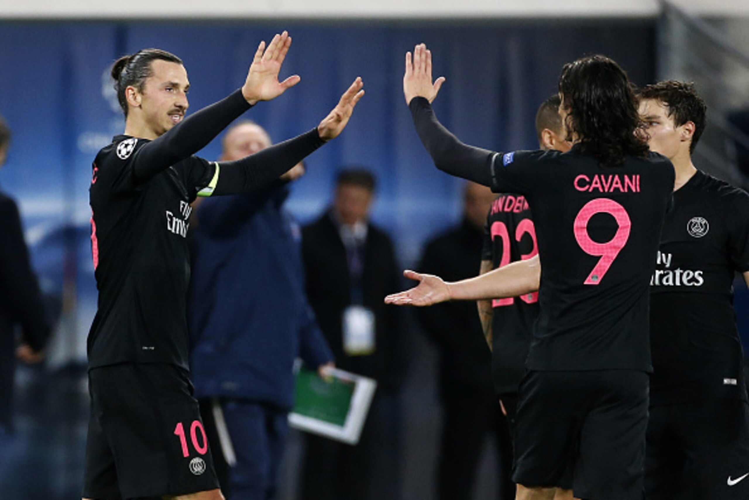 PARIS - DECEMBER 8: Zlatan Ibrahimovic of PSG celebrates his goal with Edinson Cavani of PSG during the UEFA Champions League match between Paris Saint-Germain (PSG) and FC Shakhtar Donetsk at Parc des Princes stadium on December 8, 2015 in Paris, France.