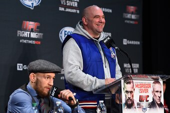 BOSTON, MA - JANUARY 18:  UFC President Dana White (R) reacts as Conor McGregor of Ireland addresses the media at the post fight press conference during the UFC Fight Night event at the TD Garden on January 18, 2015 in Boston, Massachusetts. (Photo by Jef