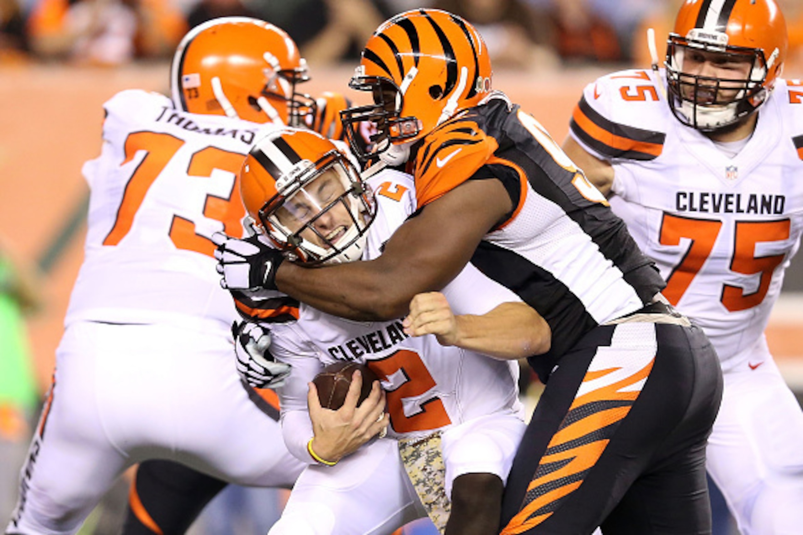 CINCINNATI, OH - NOVEMBER 5:  Geno Atkins #97 of the Cincinnati Bengals sacks Johnny Manziel #2 of the Cleveland Browns during the fourth quarter at Paul Brown Stadium on November 5, 2015 in Cincinnati, Ohio. (Photo by Andy Lyons/Getty Images)
