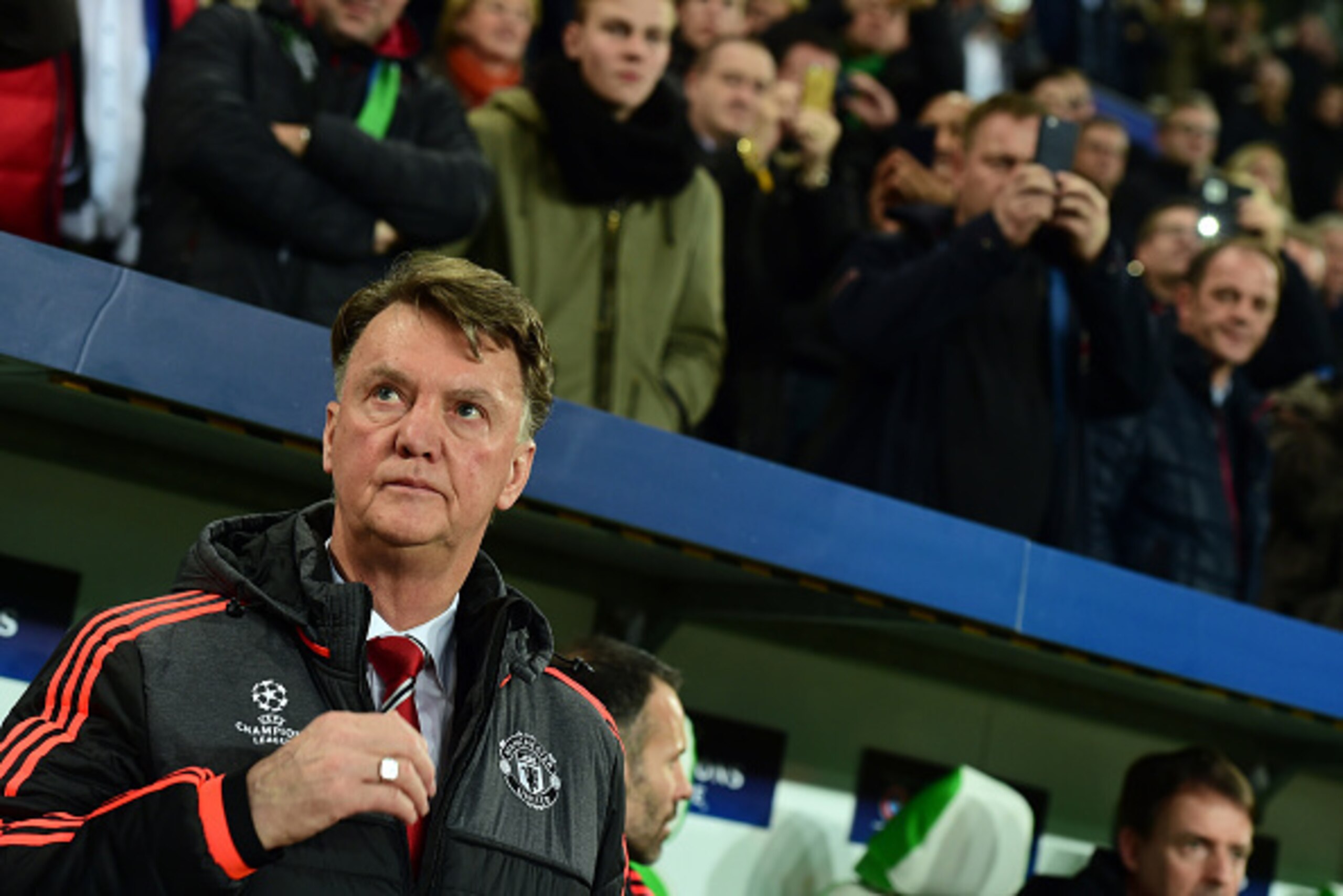 Manchester United's Dutch manager Louis van Gaal is pictured during the UEFA Champions League Group B second-leg football match VfL Wolfsburg vs Manchester United in Wolfsburg, central Germany, on December 8, 2015. AFP PHOTO / JOHN MACDOUGALL / AFP / JOHN