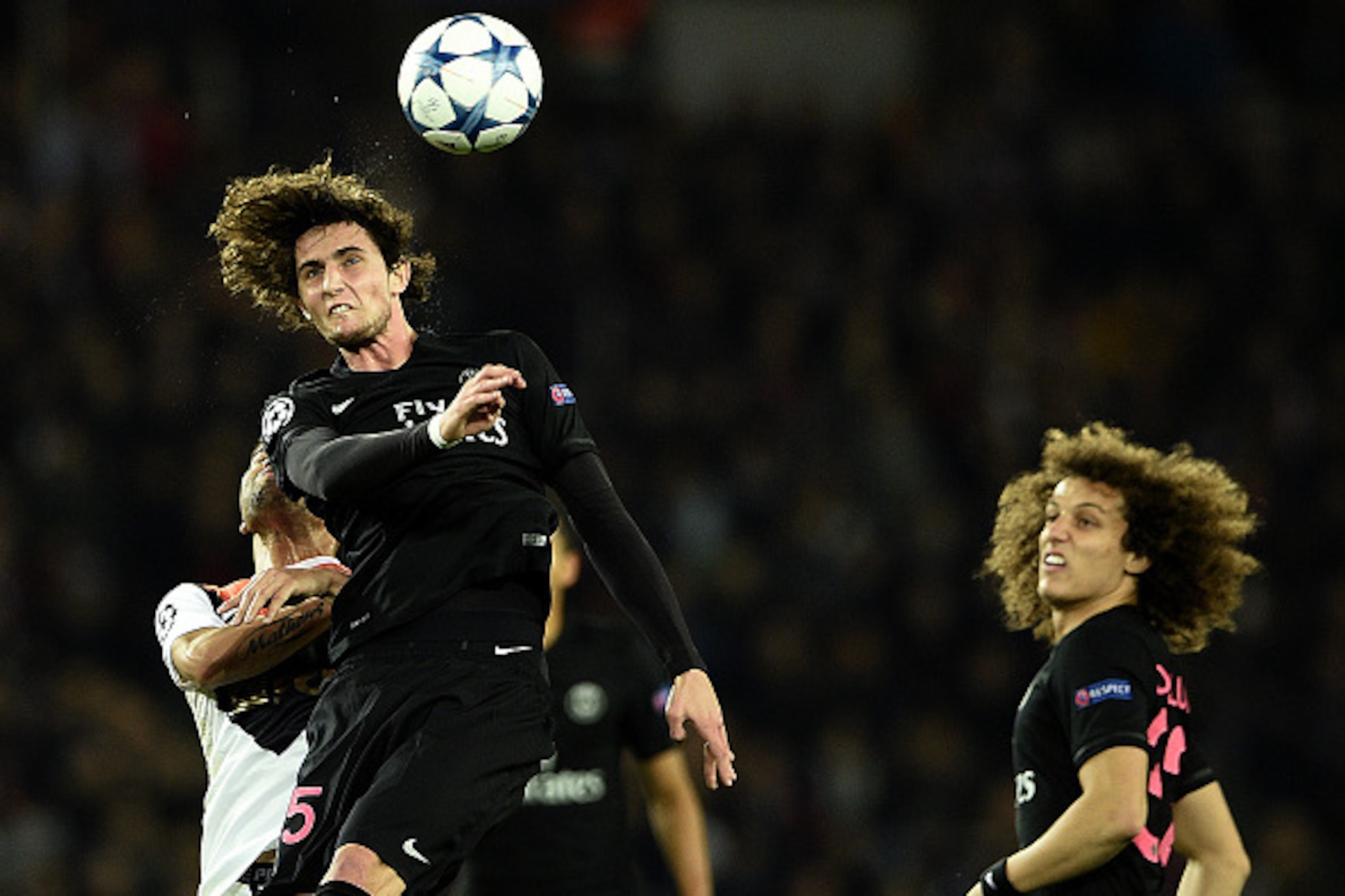 Paris Saint-Germain's French midfielder Adrien Rabiot heads the ball during the UEFA Champions League Group A football match between Paris-Saint-Germain and Shakhtar Donetsk on December 8, 2015 at the Parc des Princes stadium in Paris.  AFP PHOTO / FRANCK
