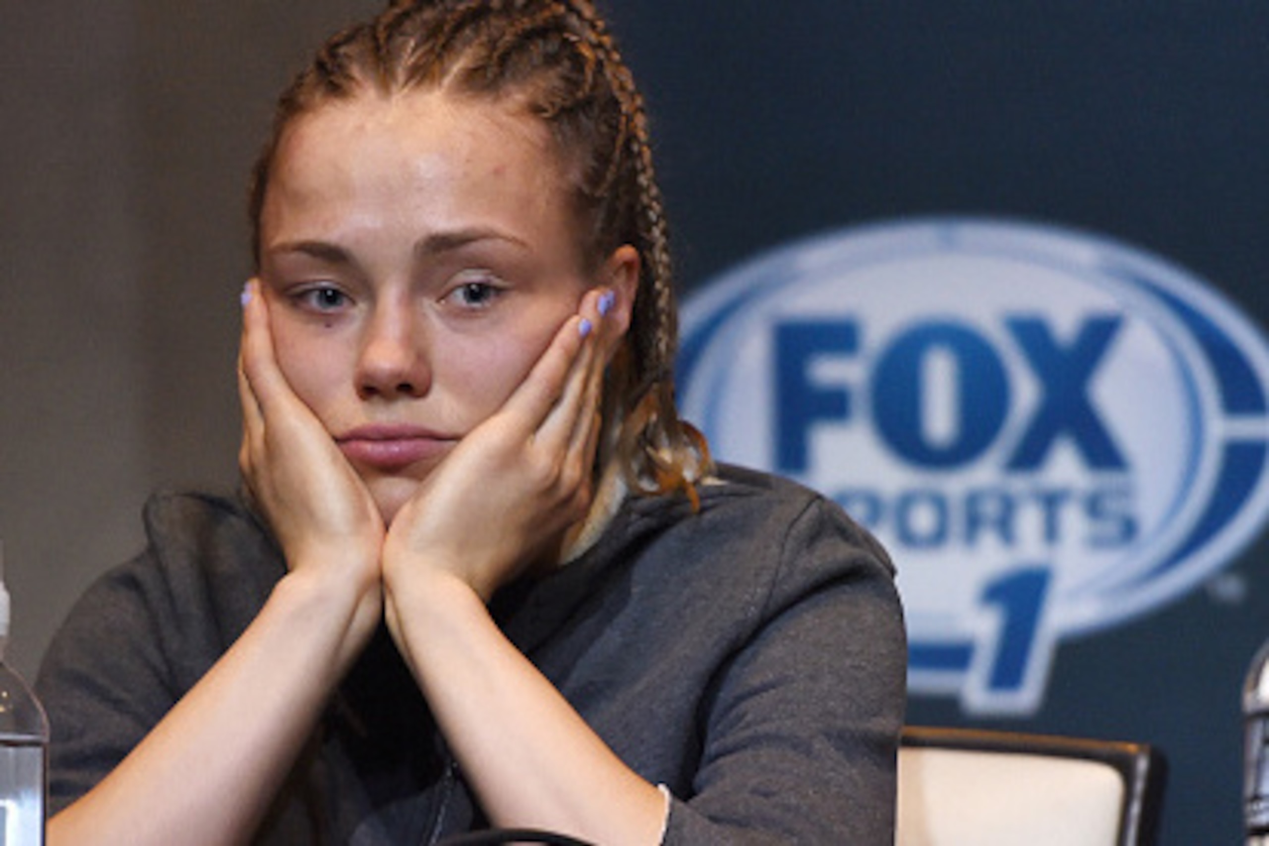 LAS VEGAS, NEVADA - DECEMBER 12:  Rose Namajunas sits onstage during The Ultimate Fighter Finale post fight press conference event inside the Palms Casino Resort on December 12, 2014 in Las Vegas, Nevada. (Photo by Jeff Bottari/Zuffa LLC/Zuffa LLC via Get