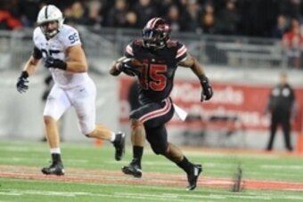 Oct 17, 2015; Columbus, OH, USA; Ohio State Buckeyes running back Ezekiel Elliott (15) carries the ball as Penn State Nittany Lions defensive end Carl Nassib (95) defends in the fourth quarter at Ohio Stadium. Mandatory Credit: James Lang-USA TODAY Sports