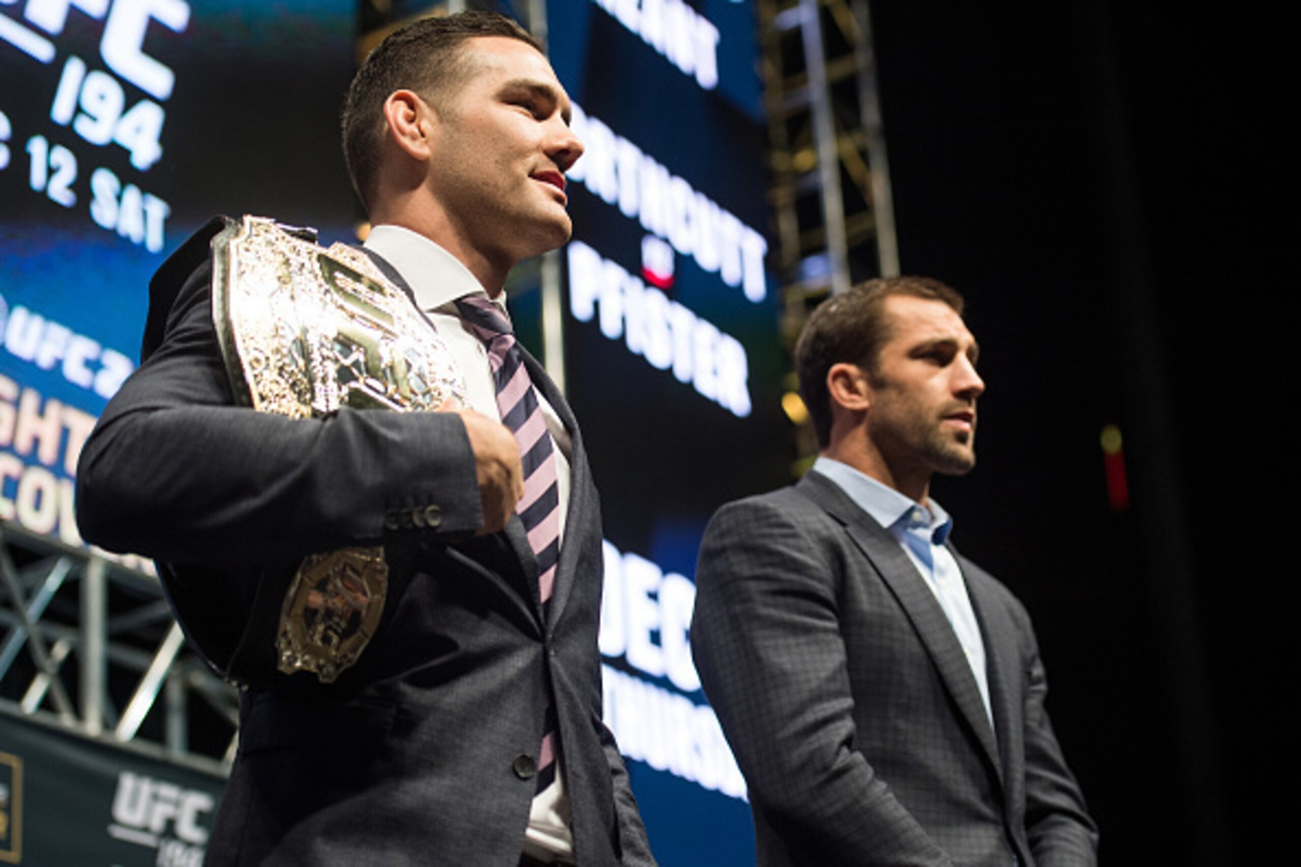 LAS VEGAS, NV - DECEMBER 09:  (L-R) UFC middleweight champion Chris Weidman and Luke Rockhold face off during the UFC Press Conference inside MGM Grand Garden Arena on December 9, 2015 in Las Vegas, Nevada.  (Photo by Brandon Magnus/Zuffa LLC/Zuffa LLC vi