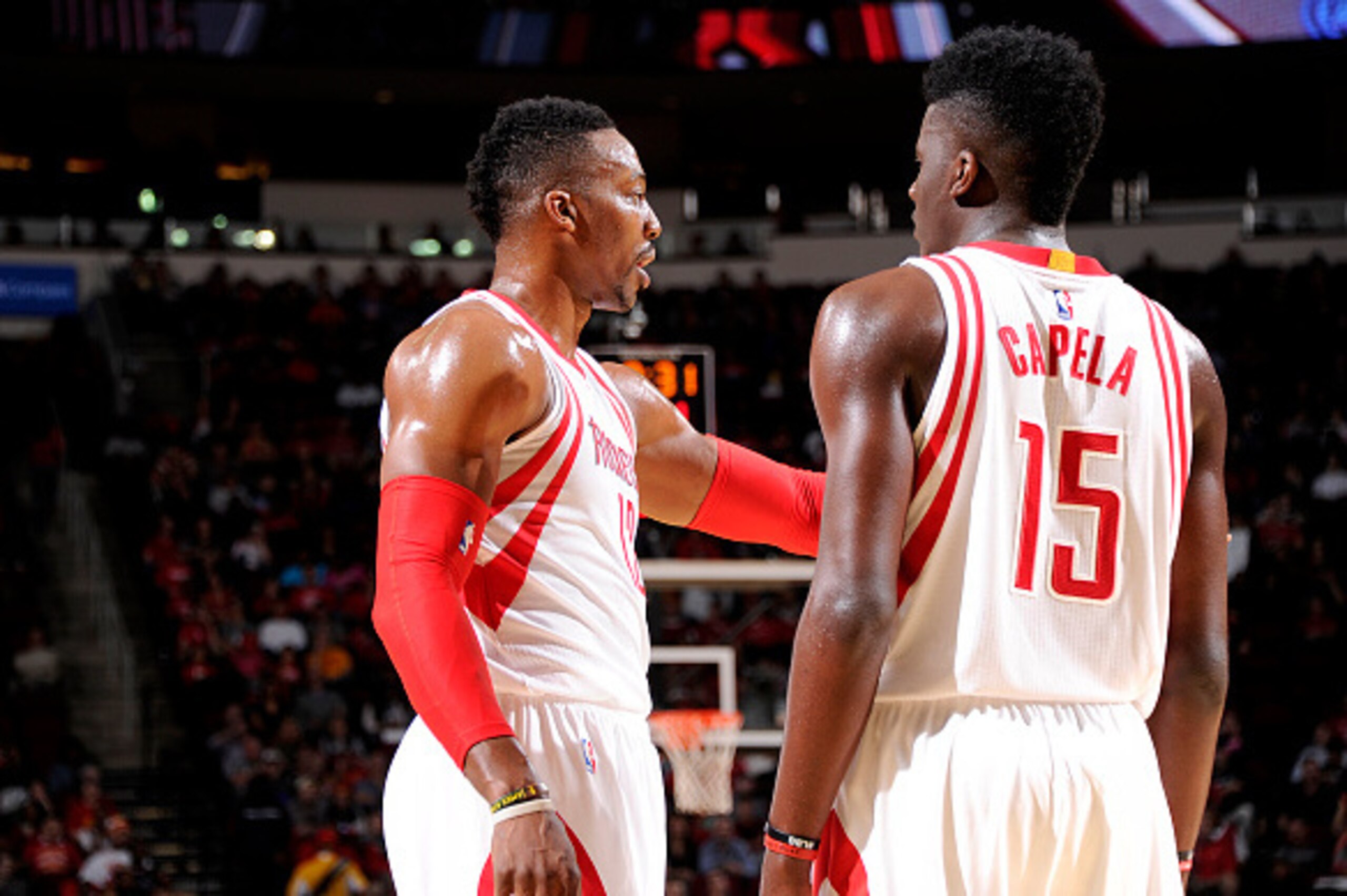 HOUSTON, TX - NOVEMBER 27: Dwight Howard #12 and Clint Capela #15 of the Houston Rockets have a quick discussion during the game against the Philadelphia 76ers on November 27, 2015 at the Toyota Center in Houston, Texas. NOTE TO USER: User expressly ackno