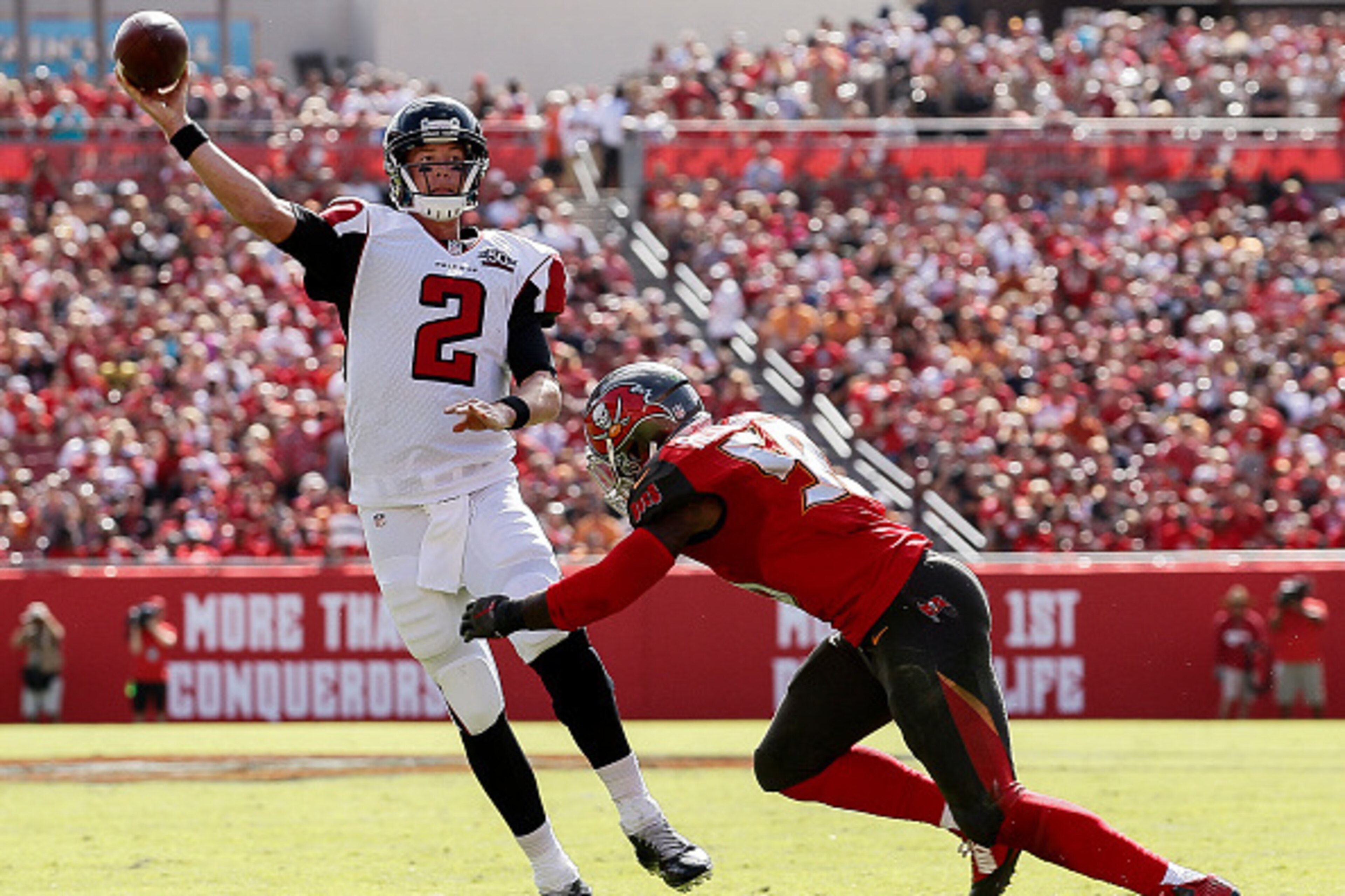 TAMPA, FL - DECEMBER 6: Quarterback Matt Ryan #2 of the Atlanta Falcons is forced out of the pocket by Linebacker Kwon Alexanders #51 during the game against the Tampa Bay Buccaneers at Raymond James Stadium on December 6, 2015 in Tampa, Florida. The Bucc