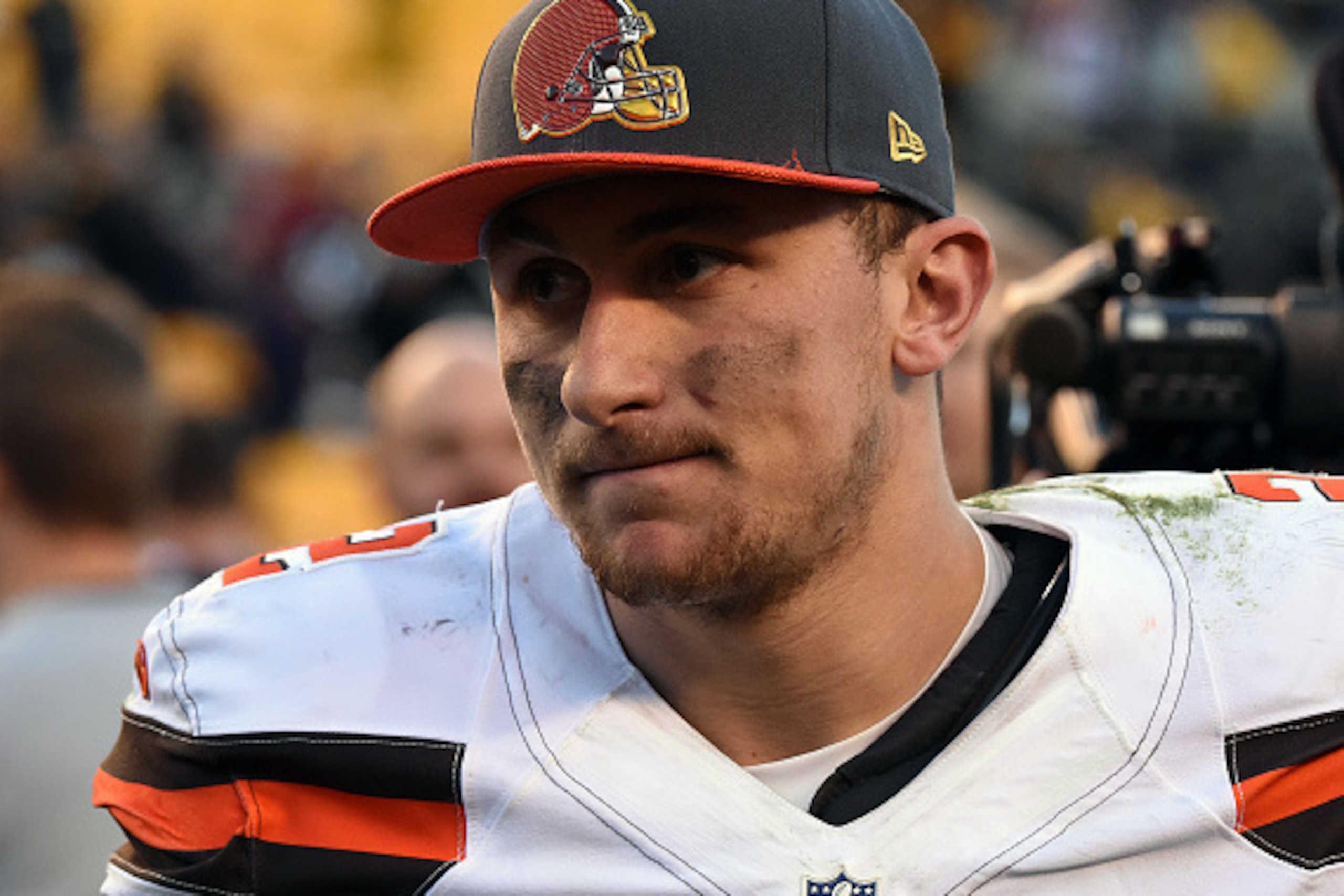 PITTSBURGH, PA - NOVEMBER 15: Quarterback Johnny Manziel #2 of the Cleveland Browns looks on from the field after a game against the Pittsburgh Steelers at Heinz Field on November 15, 2015 in Pittsburgh, Pennsylvania. The Steelers defeated the Browns 30 PITTSBURGH, PA - NOVEMBER 15: Quarterback Johnny Manziel #2 of the Cleveland Browns looks on from the field after a game against the Pittsburgh Steelers at Heinz Field on November 15, 2015 in Pittsburgh, Pennsylvania. The Steelers defeated the Browns 30