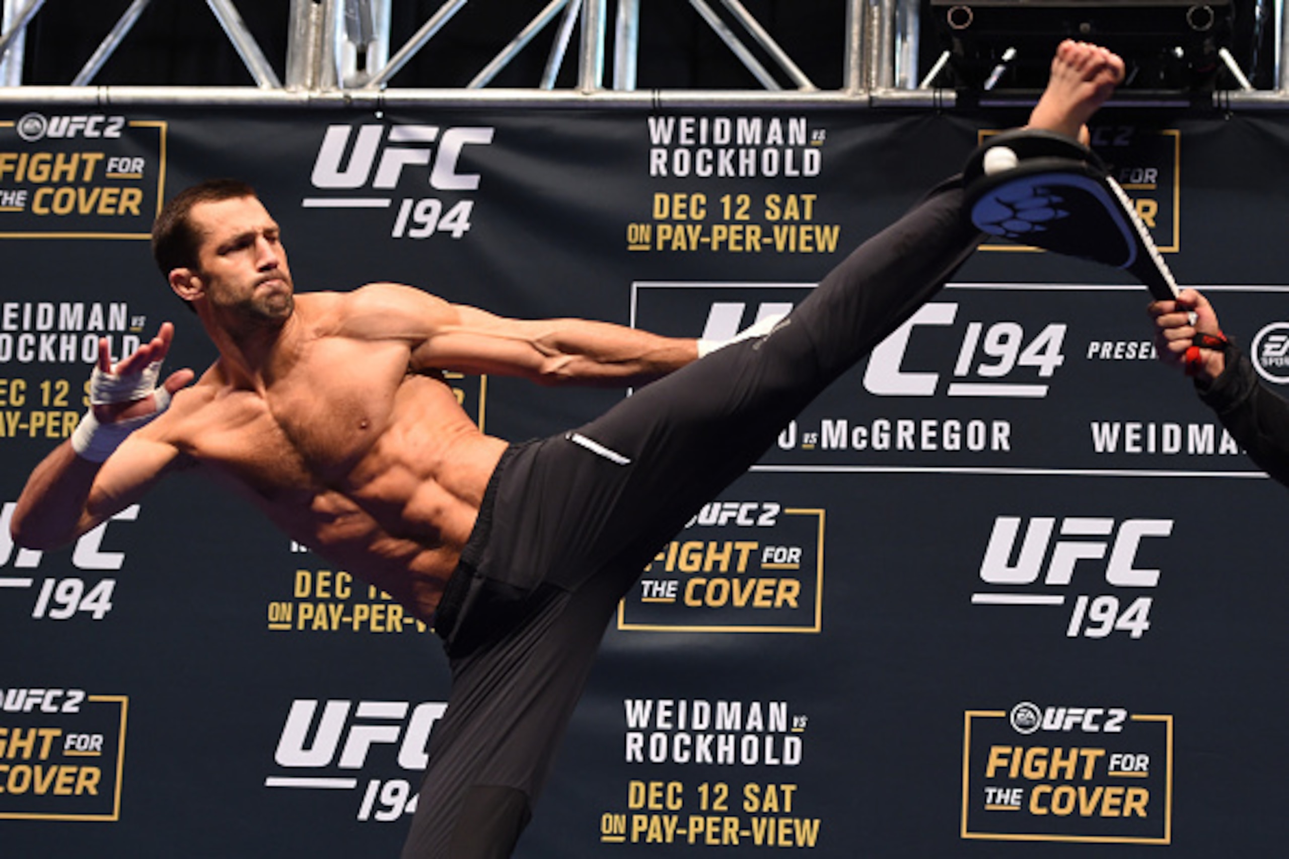 LAS VEGAS, NV - DECEMBER 10: Luke Rockhold works out for fans and media during the UFC 194 open workouts inside MGM Grand Garden Arena on December 10, 2015 in Las Vegas, Nevada. (Photo by Josh Hedges/Zuffa LLC/Zuffa LLC via Getty Images) LAS VEGAS, NV - DECEMBER 10: Luke Rockhold works out for fans and media during the UFC 194 open workouts inside MGM Grand Garden Arena on December 10, 2015 in Las Vegas, Nevada. (Photo by Josh Hedges/Zuffa LLC/Zuffa LLC via Getty Images)