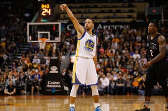 PHOENIX, AZ - NOVEMBER 27:  Stephen Curry #30 of the Golden State Warriors reacts to a three point shot against the Phoenix Suns during the NBA game at Talking Stick Resort Arena on November 27, 2015 in Phoenix, Arizona.  NOTE TO USER: User expressly ackn