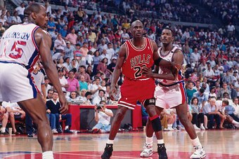 AUBURN HILLS, MI - 1990: Michael Jordan #23 of the Chicago Bulls battles for position against Joe Dumars #4 of the Detroit Pistons circa 1990 at the Palace of Auburn Hills in Auburn Hills, Michigan. NOTE TO USER: User expressly acknowledges and agrees tha