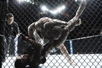 December 10, 2015; Las Vegas, NV, USA; Danny Roberts applies a choke hold against Nathan Coy during UFC Fight Night at The Chelsea at the Cosmopolitan. Mandatory Credit: Gary A. Vasquez-USA TODAY Sports