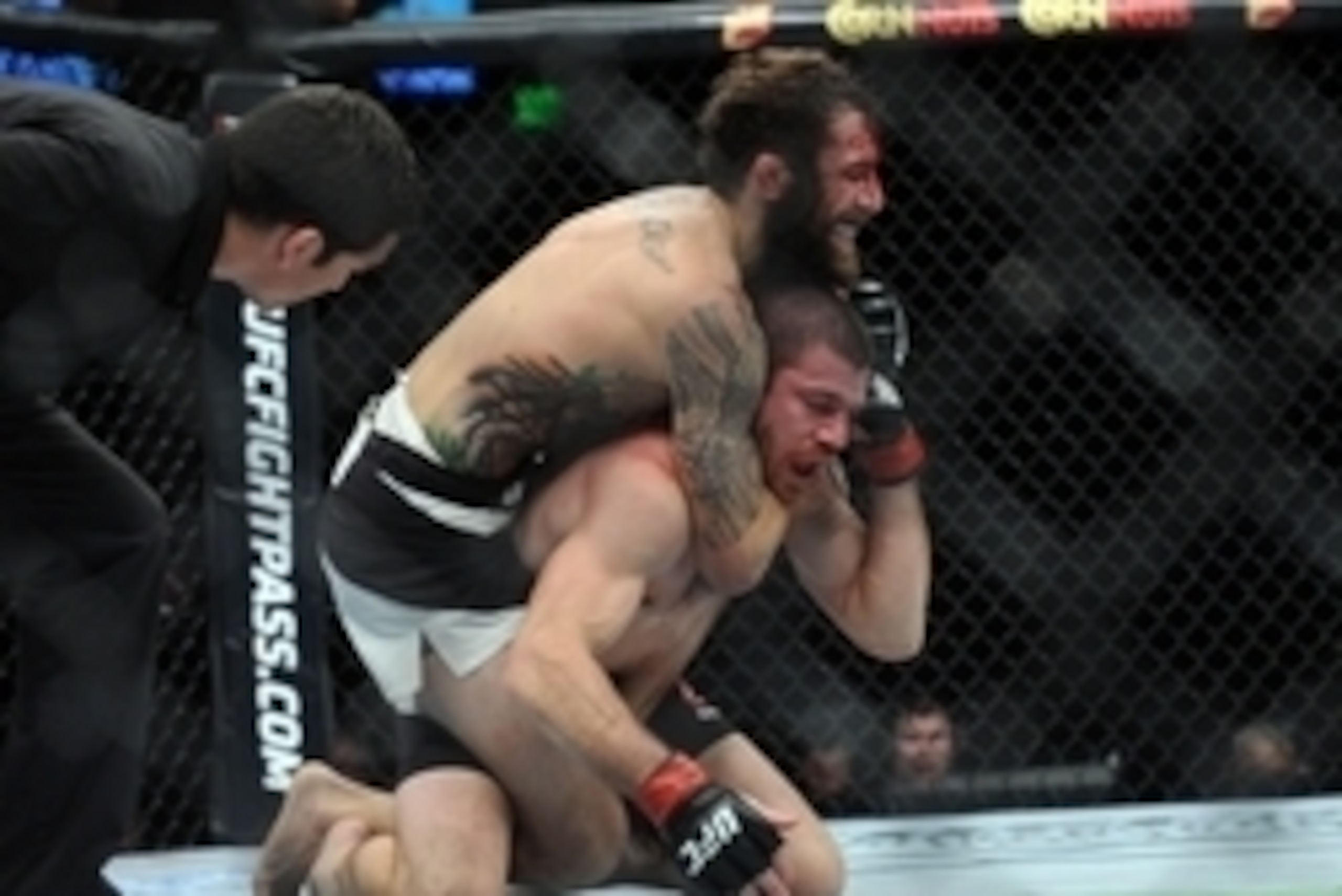 December 10, 2015; Las Vegas, NV, USA; Michael Chiesa  applies a choke hold to win by submission against Jim Miller during UFC Fight Night at The Chelsea at the Cosmopolitan. Mandatory Credit: Gary A. Vasquez-USA TODAY Sports