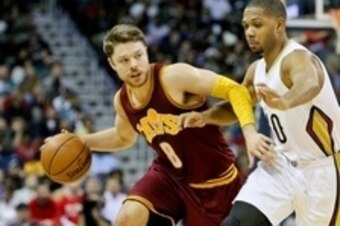 Dec 4, 2015; New Orleans, LA, USA; Cleveland Cavaliers guard Matthew Dellavedova (8) drives past New Orleans Pelicans guard Eric Gordon (10) during the first half of a game at the Smoothie King Center. Mandatory Credit: Derick E. Hingle-USA TODAY Sports