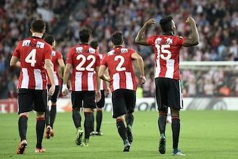 Athletic Bilbao's forward Inaki Williams Arthuer (R) celebrates after scoring during the UEFA Europa League group L football match Athletic Club Bilbao vs FK Partizan at the San Mames stadium in Bilbao on November 5, 2015.   AFP PHOTO/ ANDER GILLENEA     
