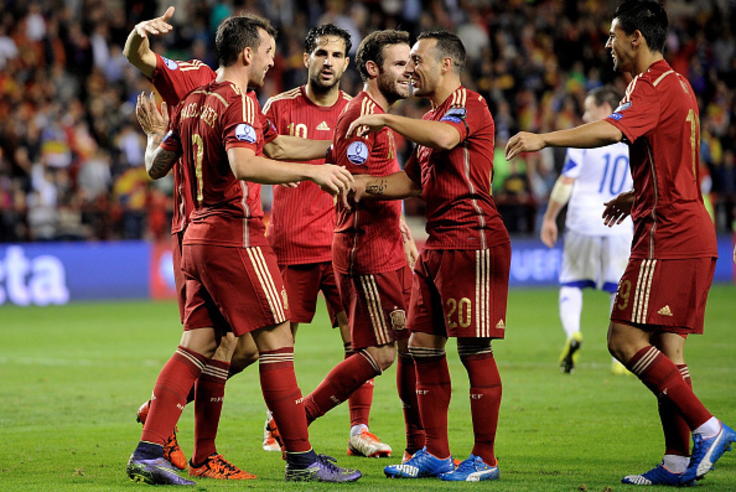 LOGRONO, SPAIN - OCTOBER 09: Paco Alcacer of Spain celebrates with teammates after scoring his team's 3rd goal during the UEFA EURO 2016 Qualifier group C match between Spain and Luxembourg at Estadio Municipal Las Gaunas on October 9, 2015 in Logrono, S LOGRONO, SPAIN - OCTOBER 09: Paco Alcacer of Spain celebrates with teammates after scoring his team's 3rd goal during the UEFA EURO 2016 Qualifier group C match between Spain and Luxembourg at Estadio Municipal Las Gaunas on October 9, 2015 in Logrono, S