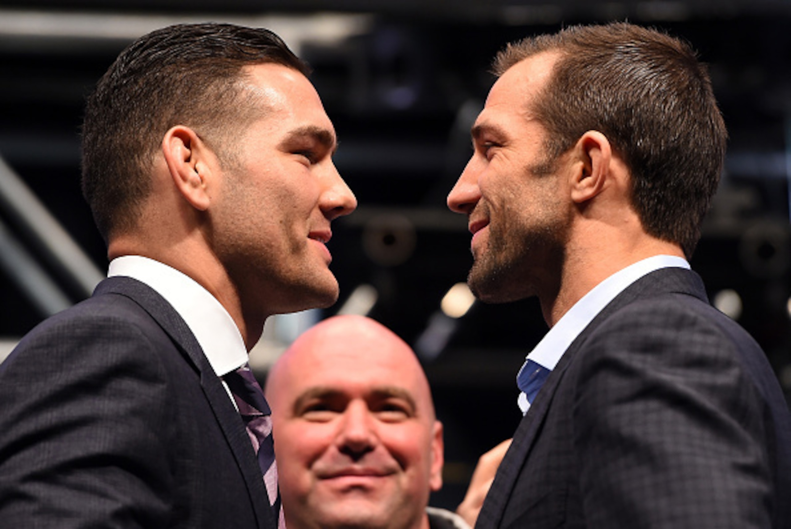 LAS VEGAS, NV - DECEMBER 09:  (L-R) Opponents Chris Weidman and Luke Rockhold face off during the UFC Press Conference inside MGM Grand Garden Arena on December 9, 2015 in Las Vegas, Nevada.  (Photo by Josh Hedges/Zuffa LLC/Zuffa LLC via Getty Images)